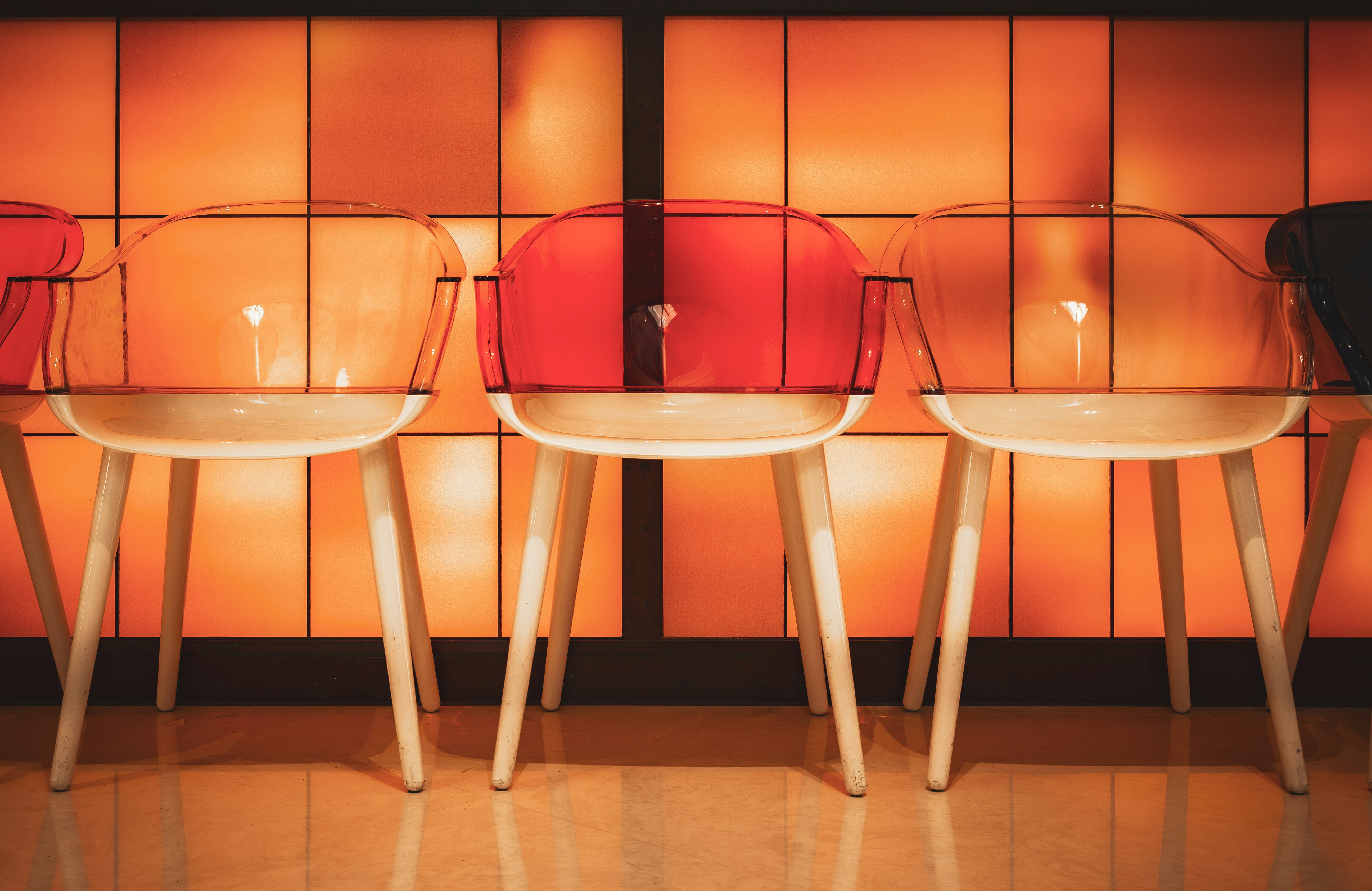 Row of modern chairs with translucent seats