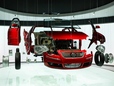 Exploded view of a red volkswagen car