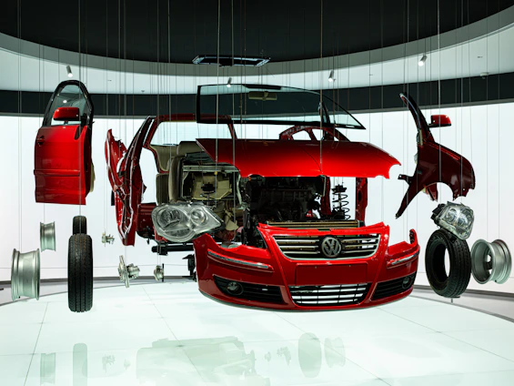 Exploded view of a red volkswagen car