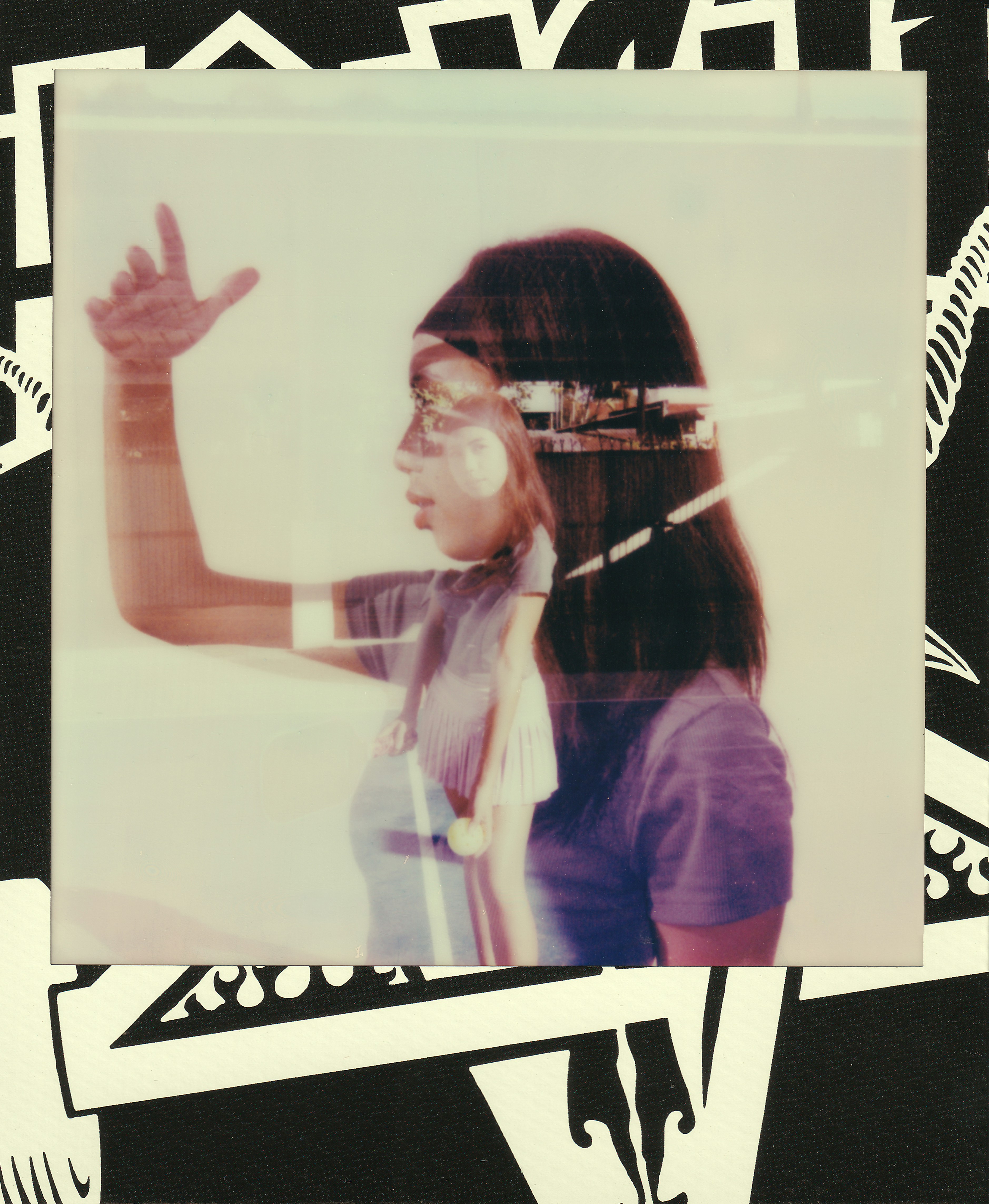 Woman with arm raised, double exposure effect