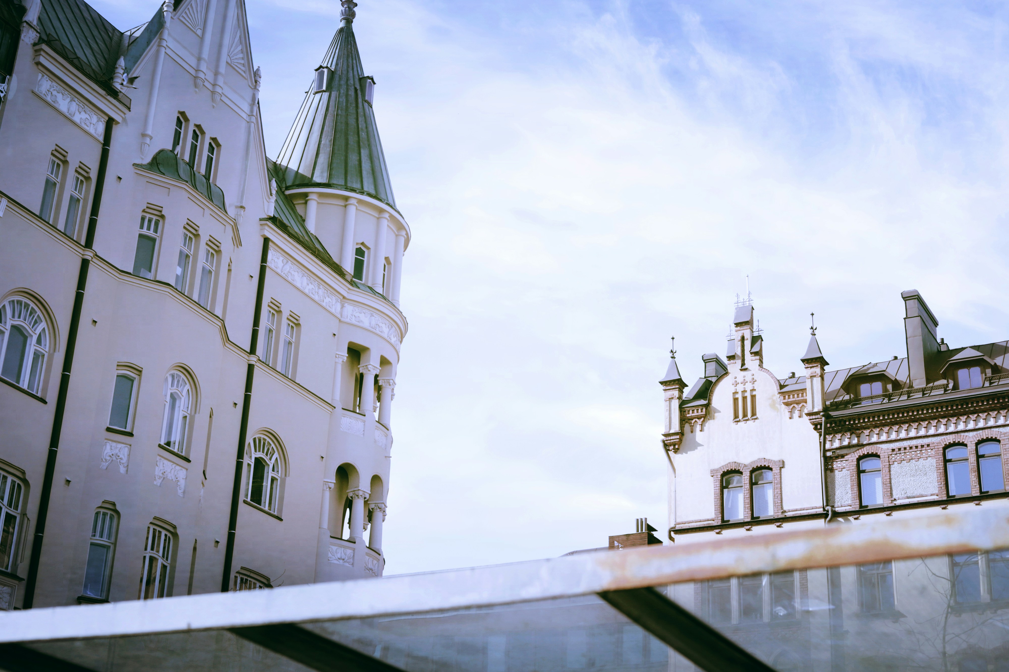 Historic buildings under a cloudy sky