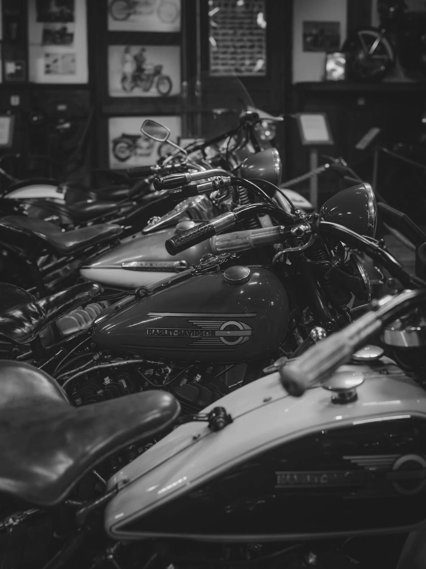 Row of vintage motorcycles with chrome tanks parked in a shop, like the bikes serviced at Kings North Coast Customs
