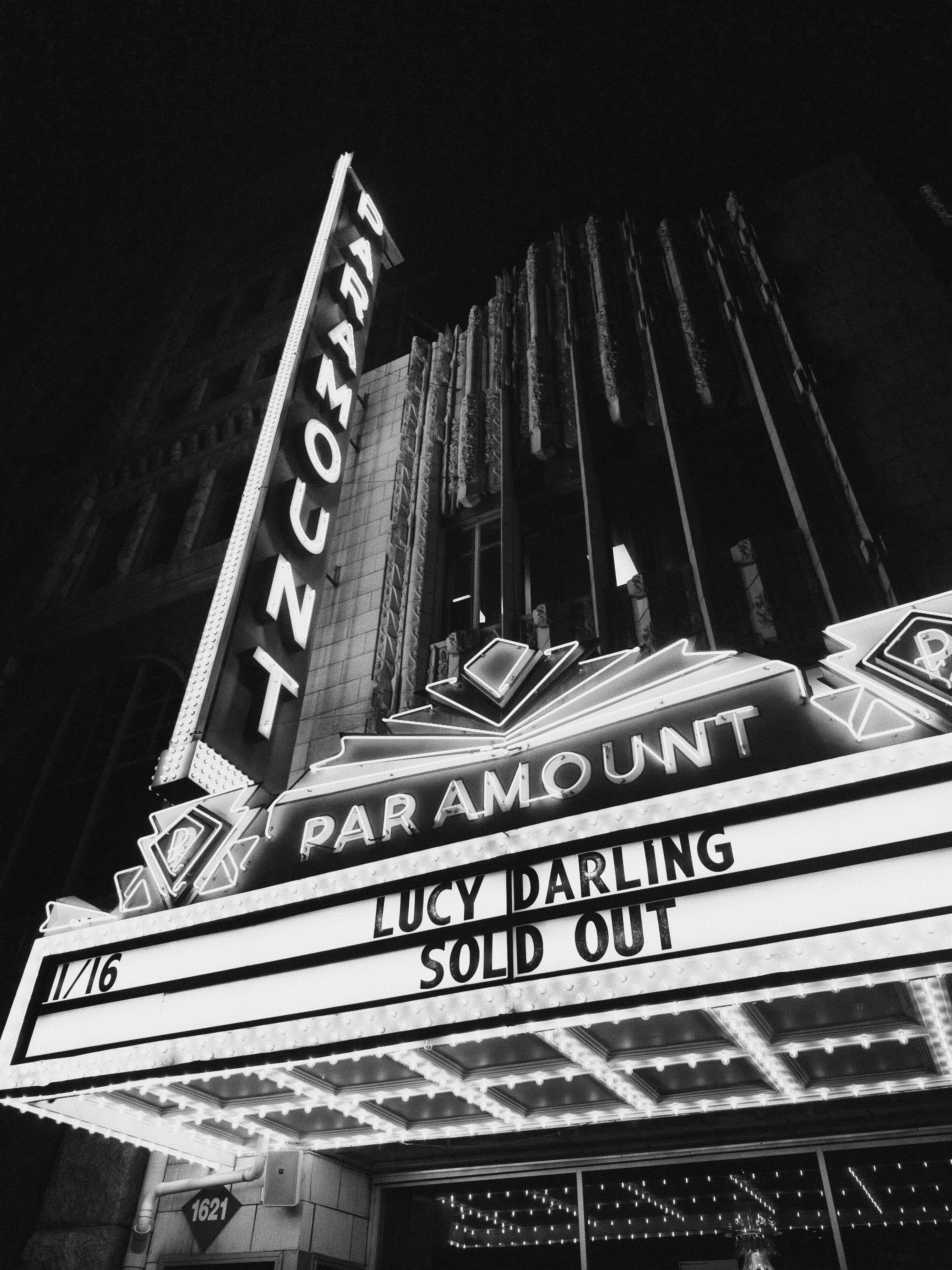 Paramount theater marquee at night with sold out sign