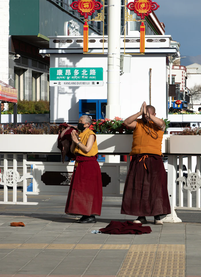 Monks in prayer at a Buddhist temple