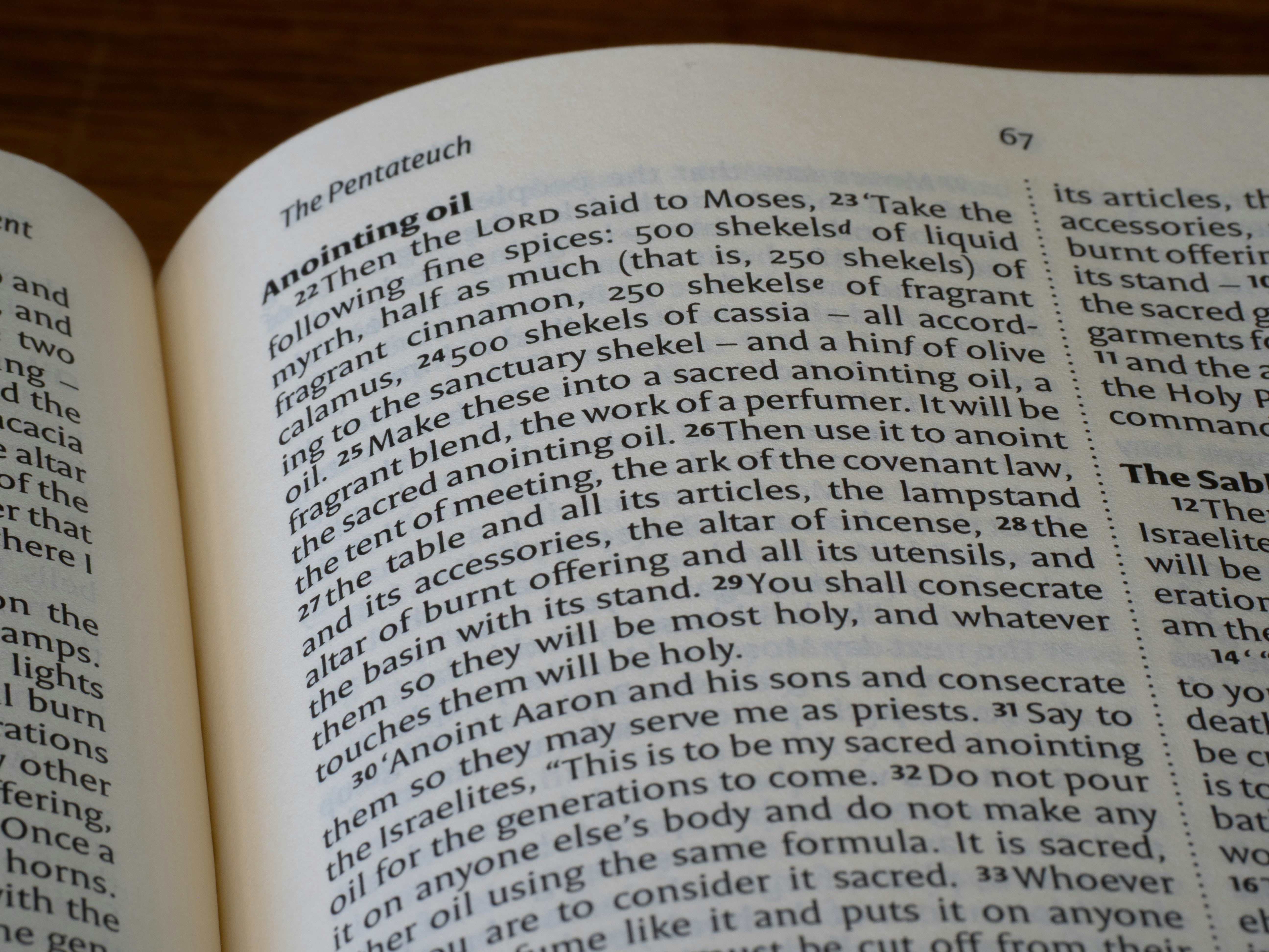 Close-up of an open book with text visible.