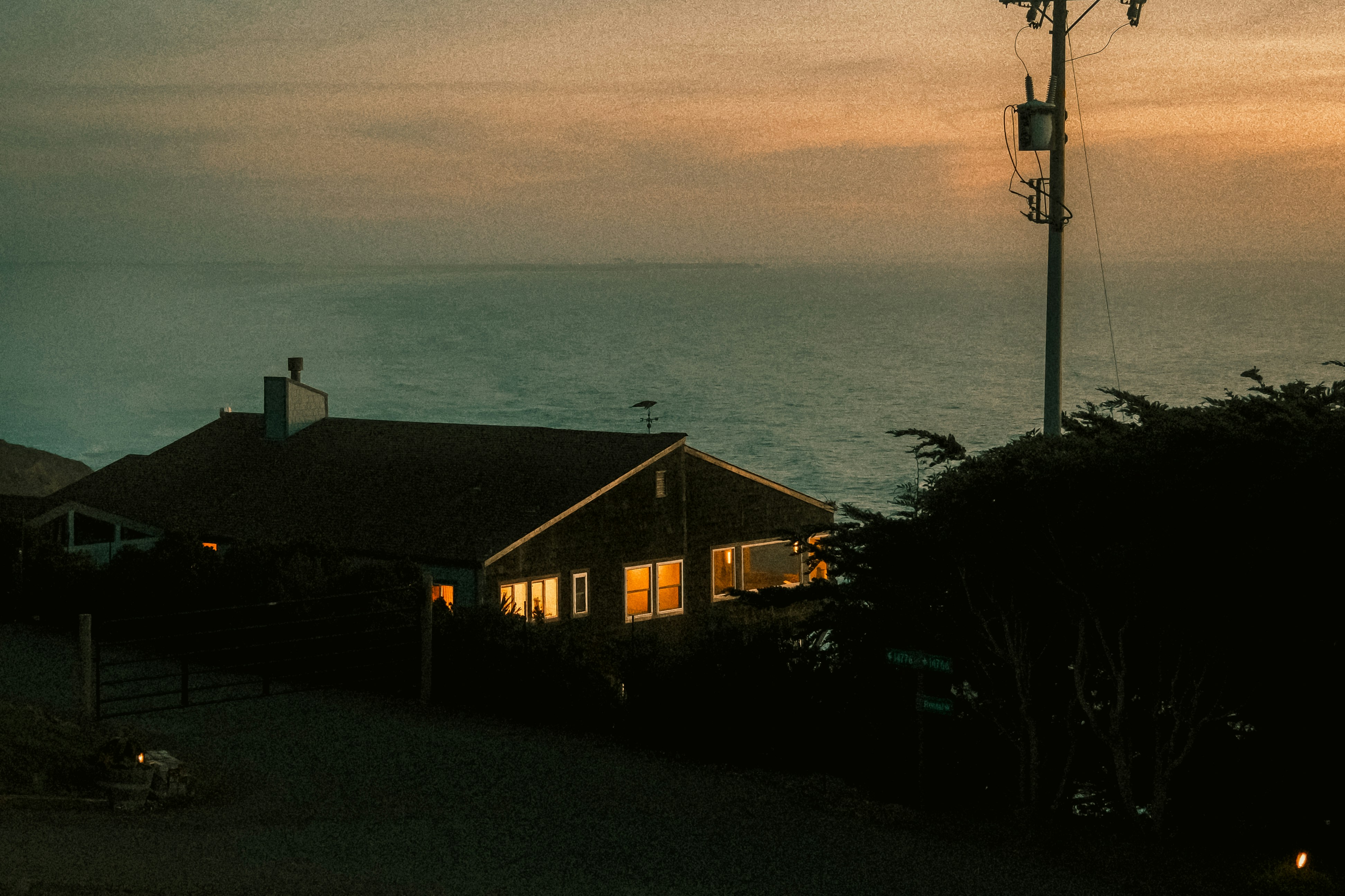 House by the ocean at dusk