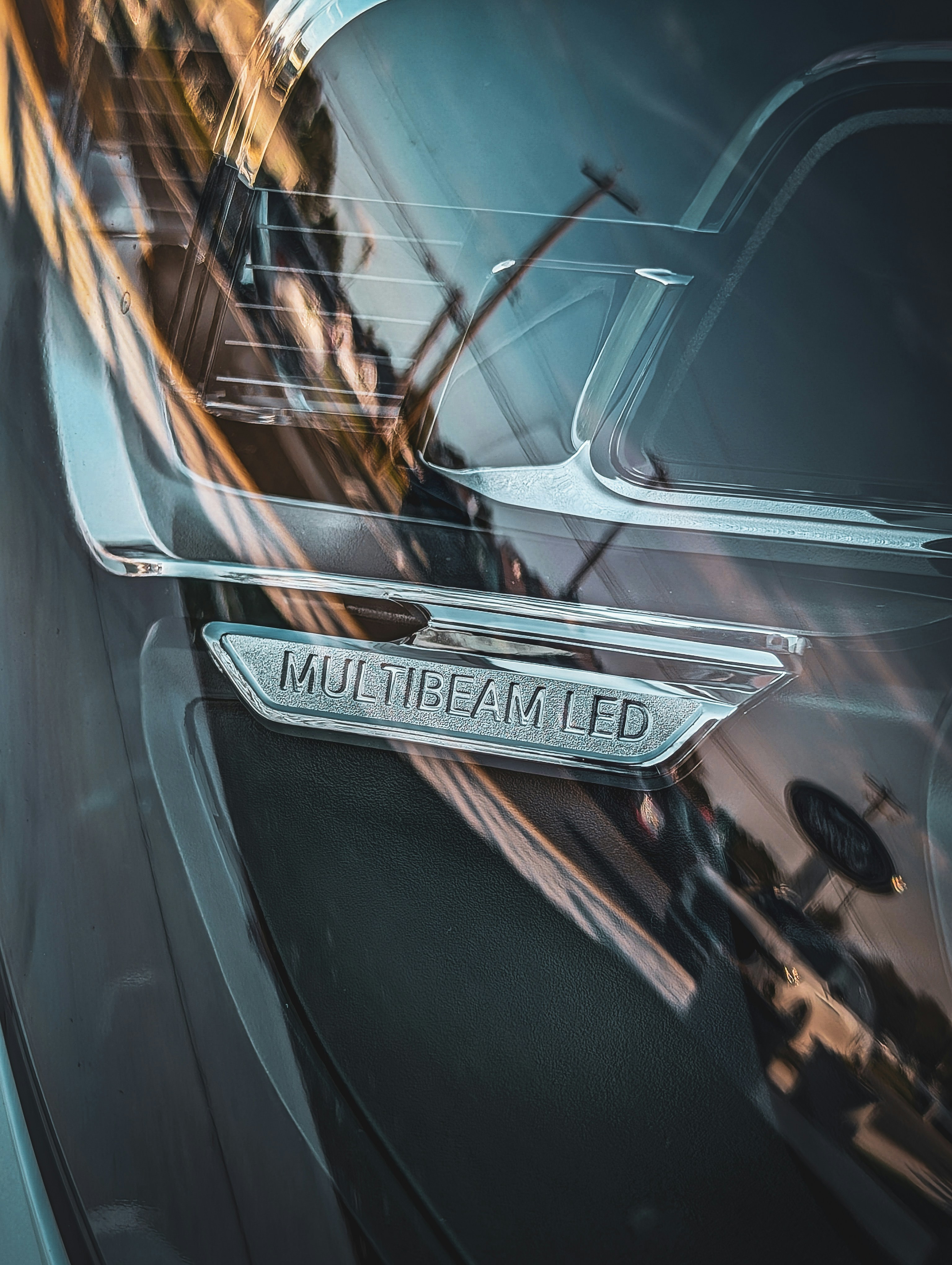 Close-up of a car's multibeam led emblem.