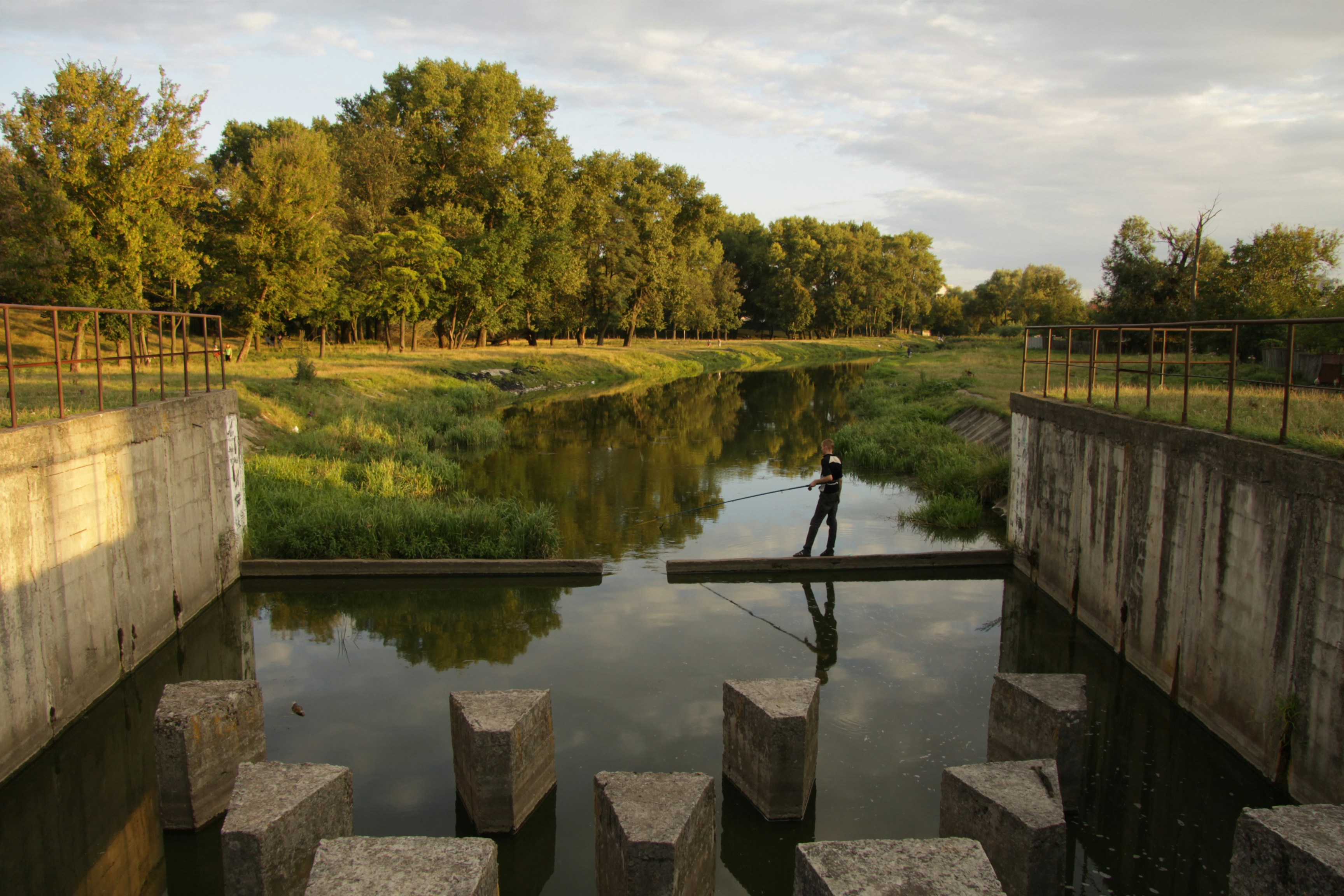 Concrete structure with water and trees