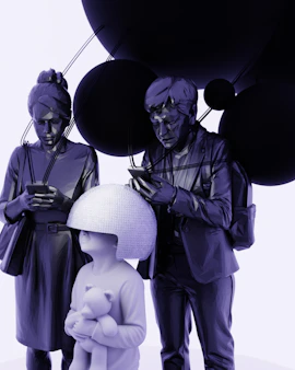 Family with child looking at phones near dark spheres