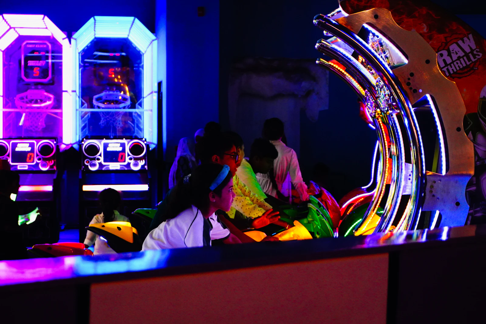 Kids playing arcade games