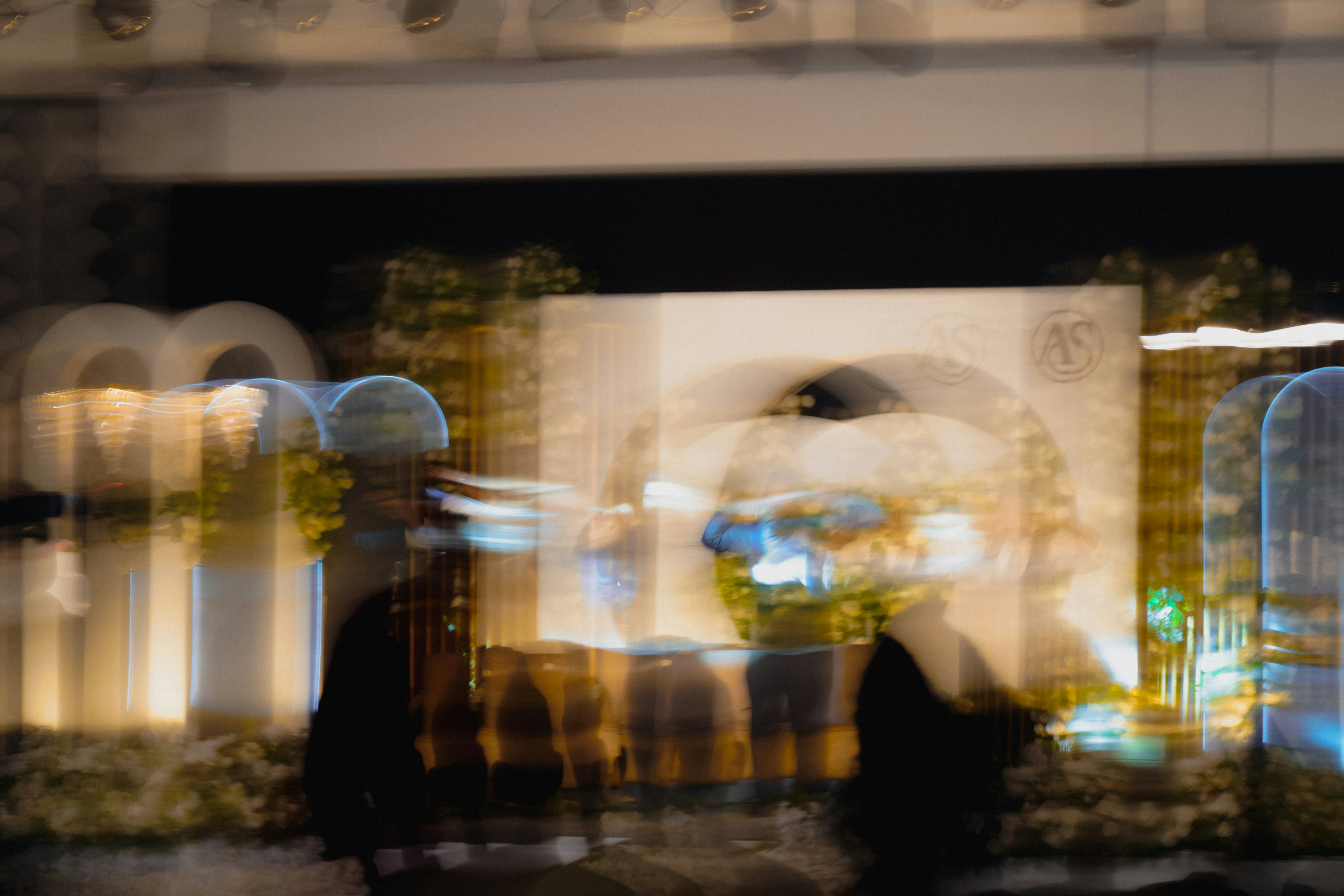 Blurry abstract depiction of city lights and figures