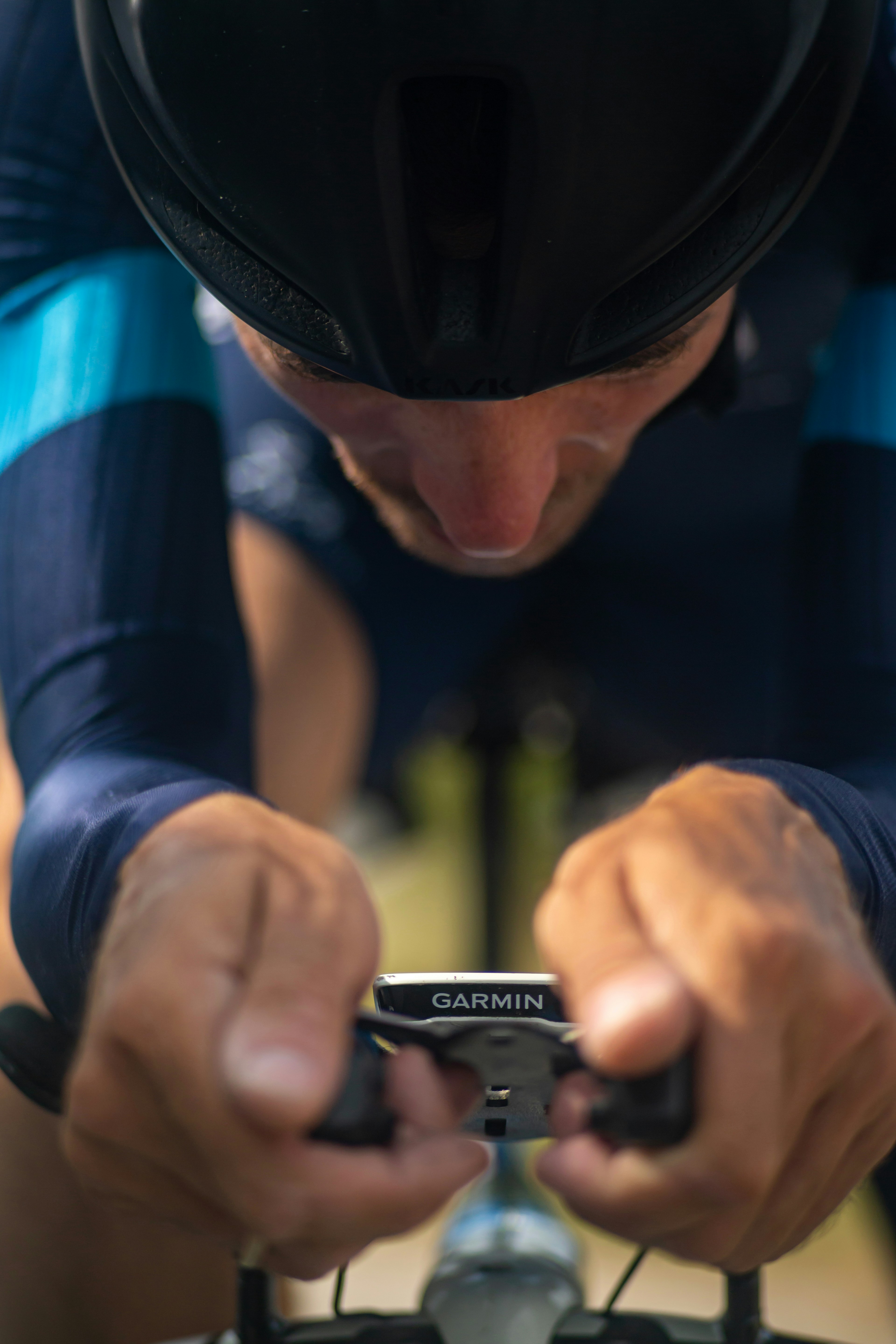 Cyclist in aerodynamic position on a racing bicycle