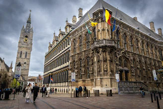 Historic buildings and a clock tower in a european city.