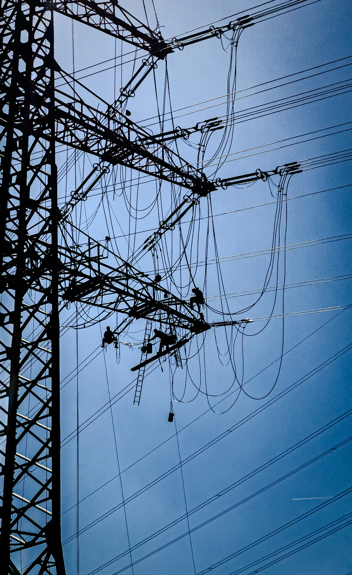Crew working on a transmission tower