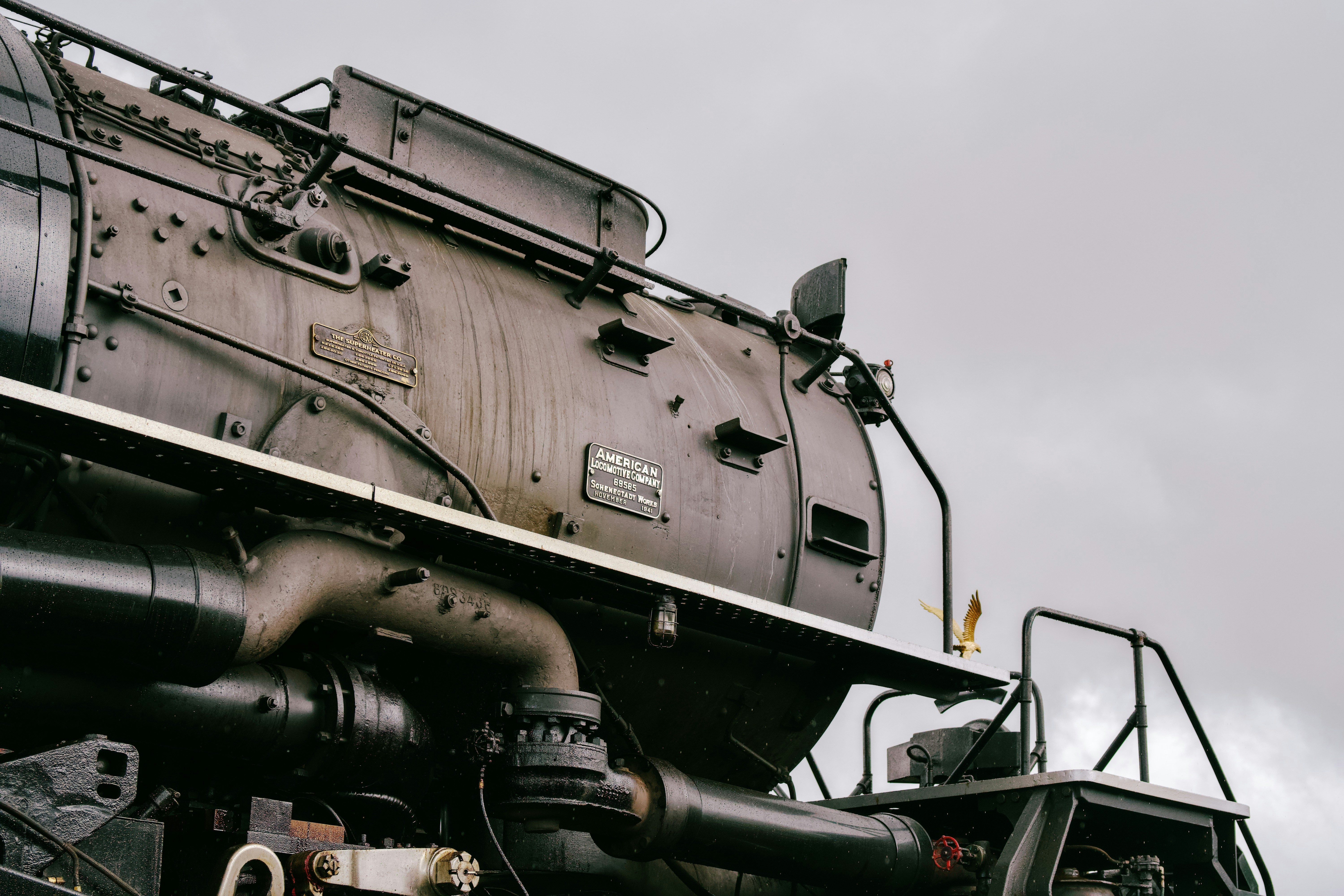 Close-up of a vintage steam locomotive engine