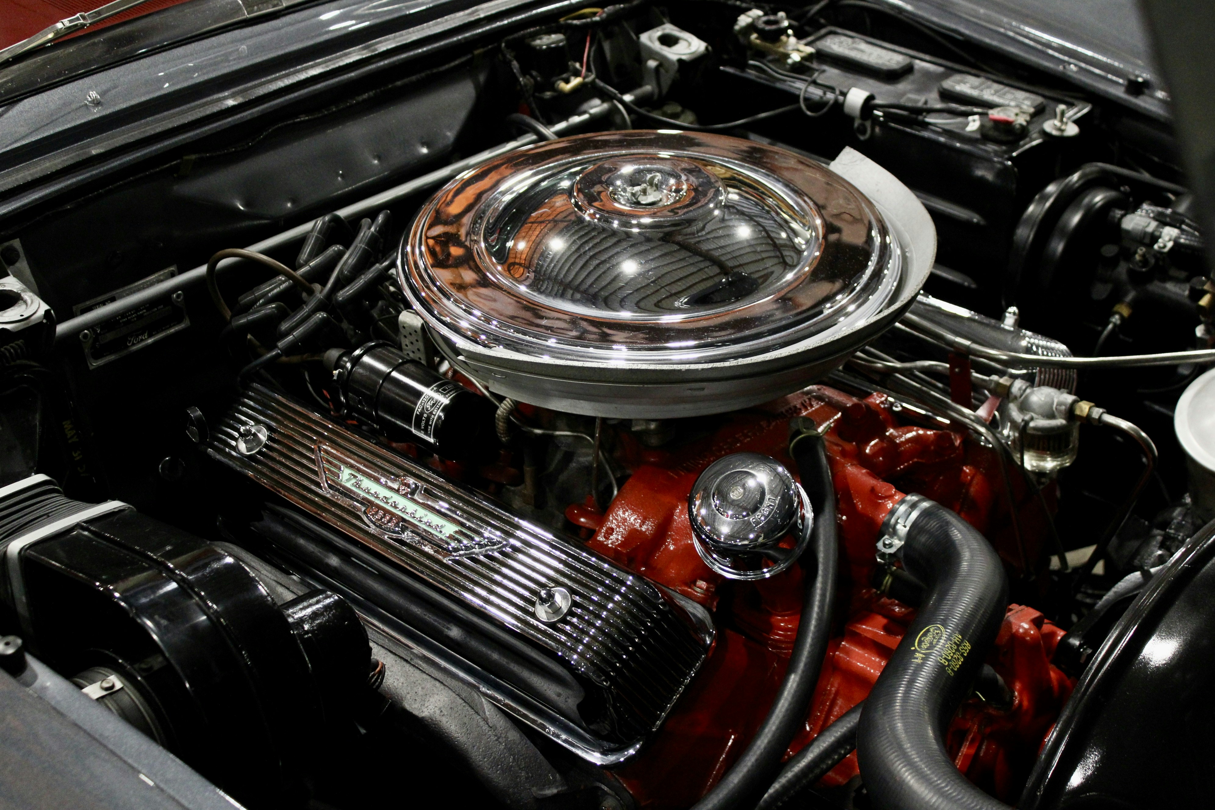 Close-up of a vintage car engine with chrome details