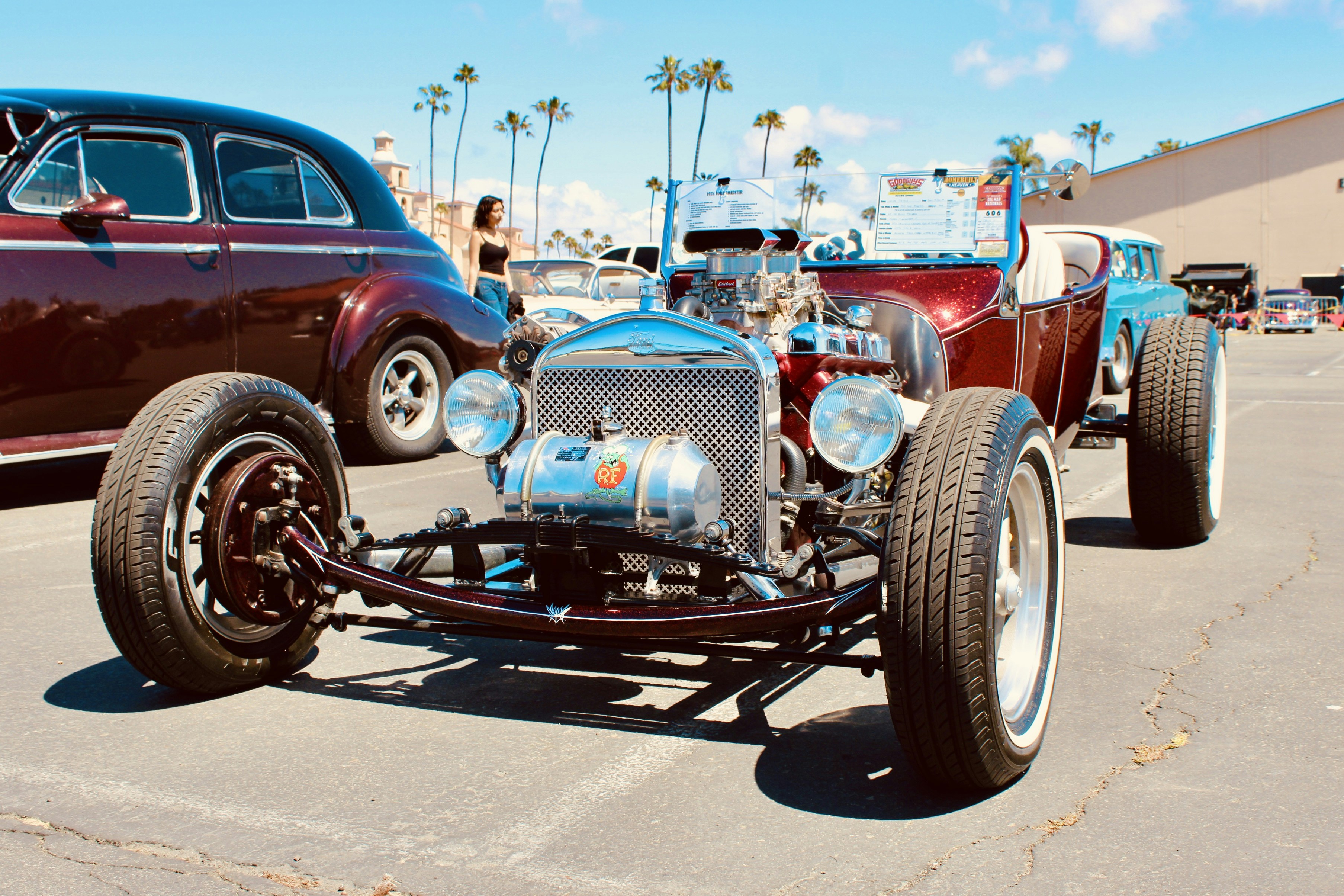 Vintage red hot rod car parked outdoors