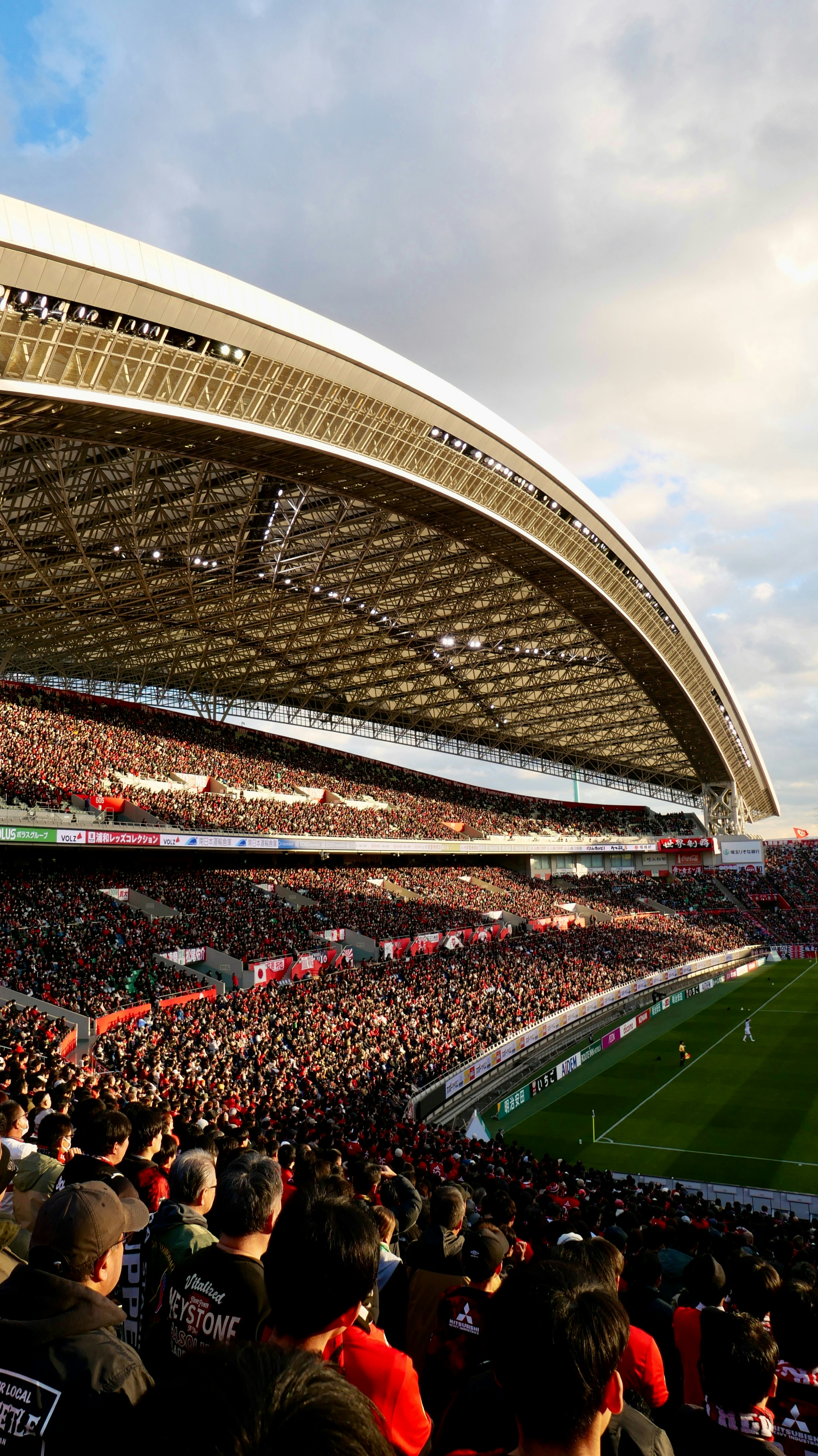 Crowded stadium with spectators watching a game
