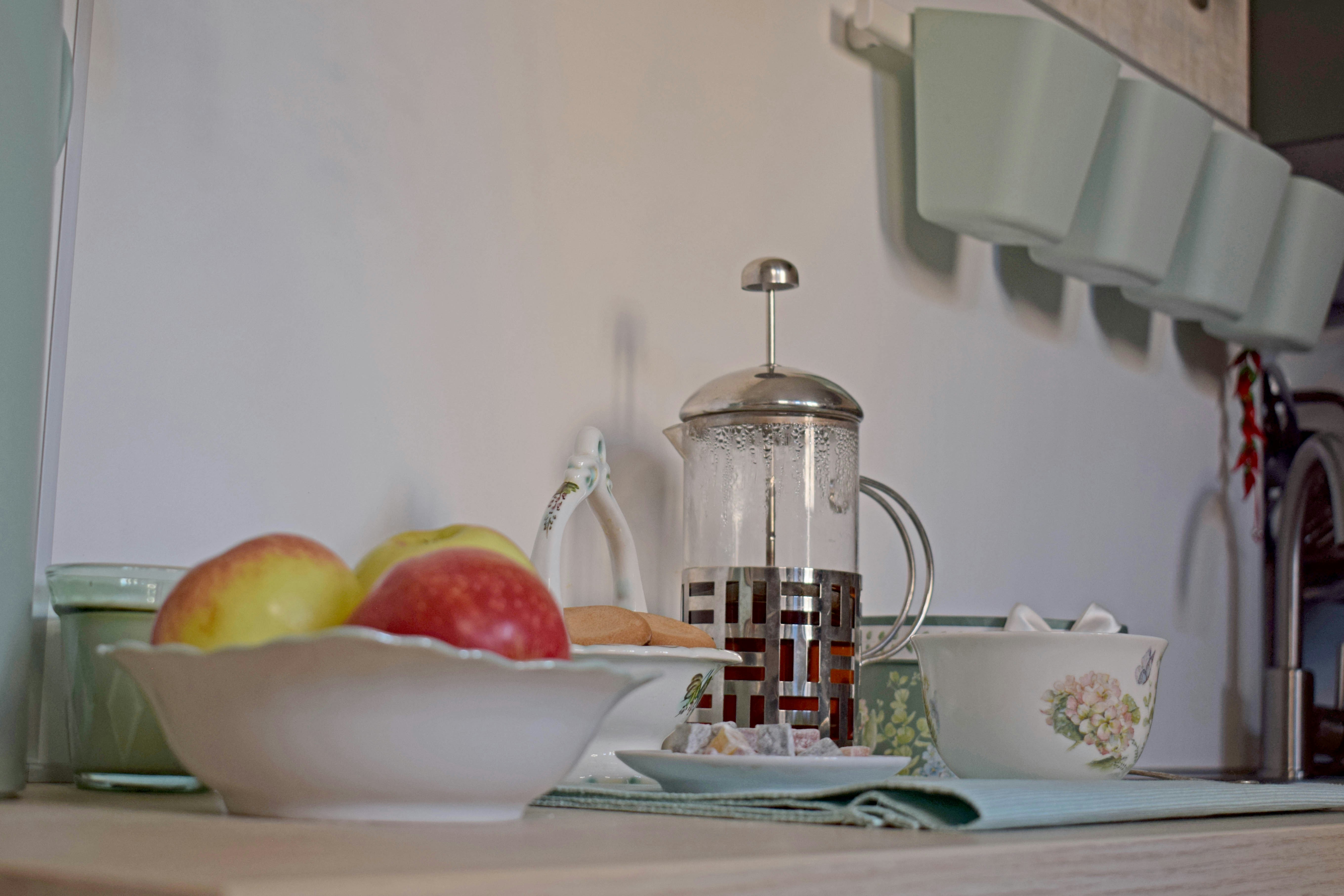 French press coffee with apples and sweets