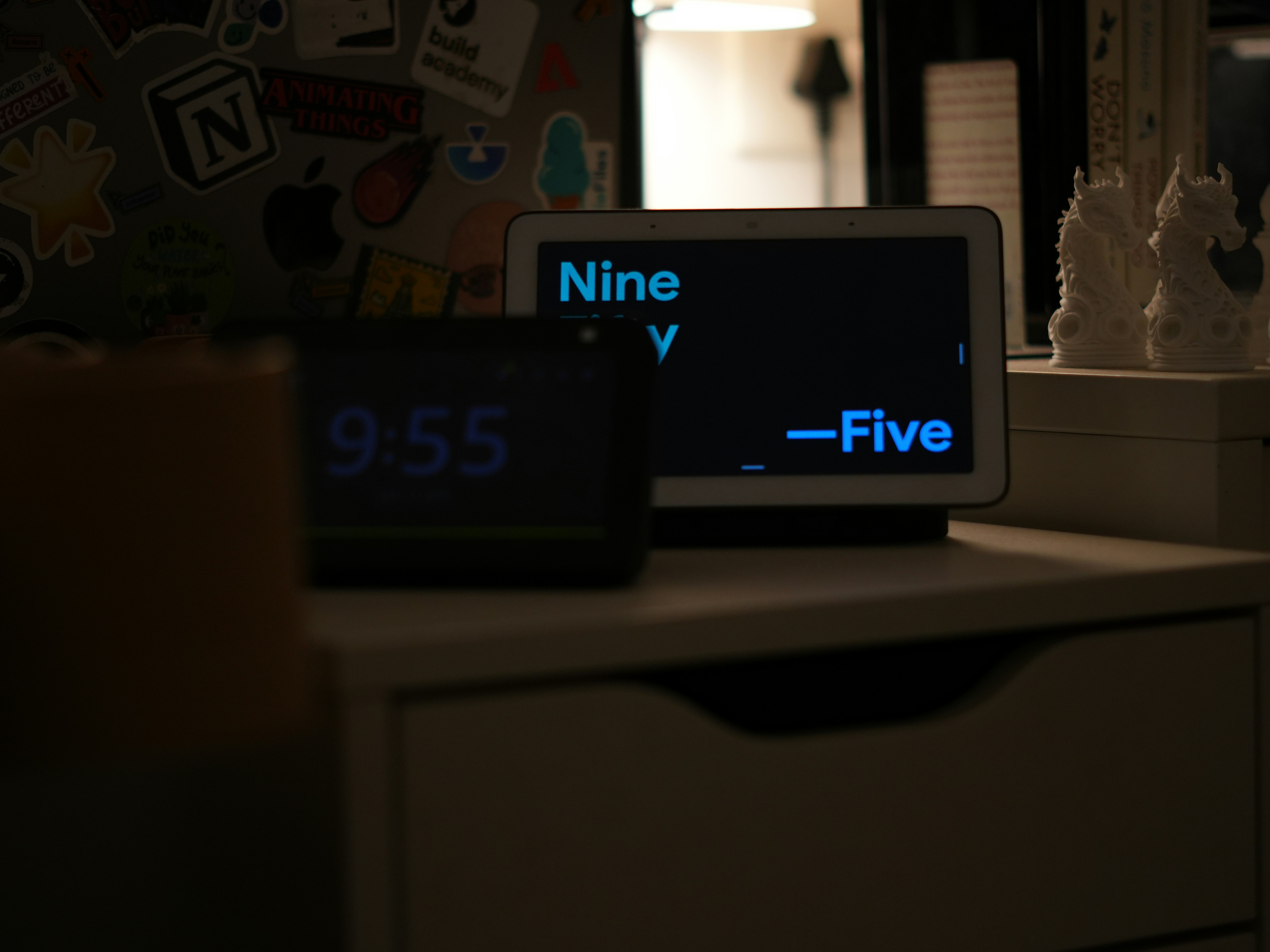 Two digital clocks display different times