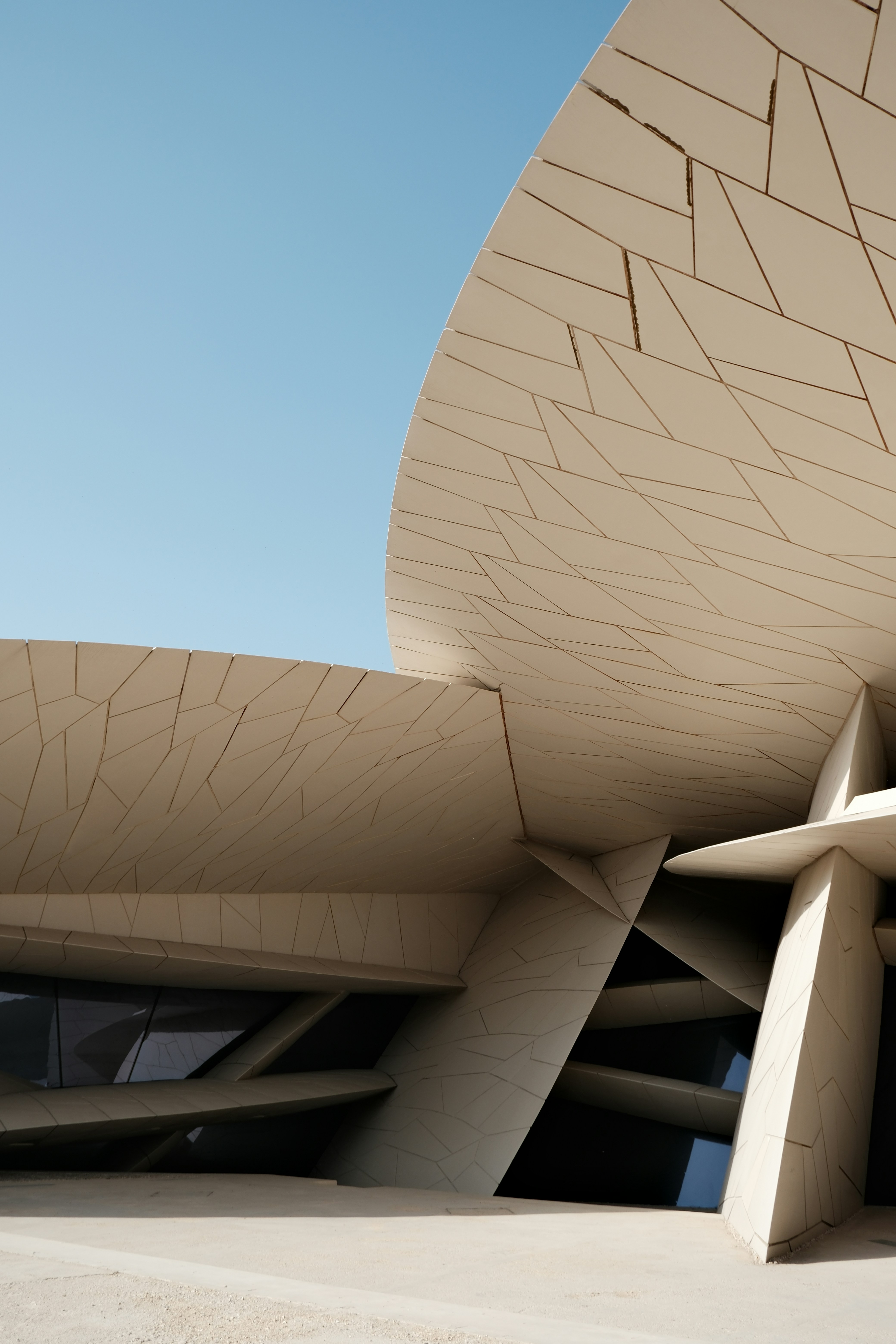 Modern architectural design with geometric shapes against sky photo ...
