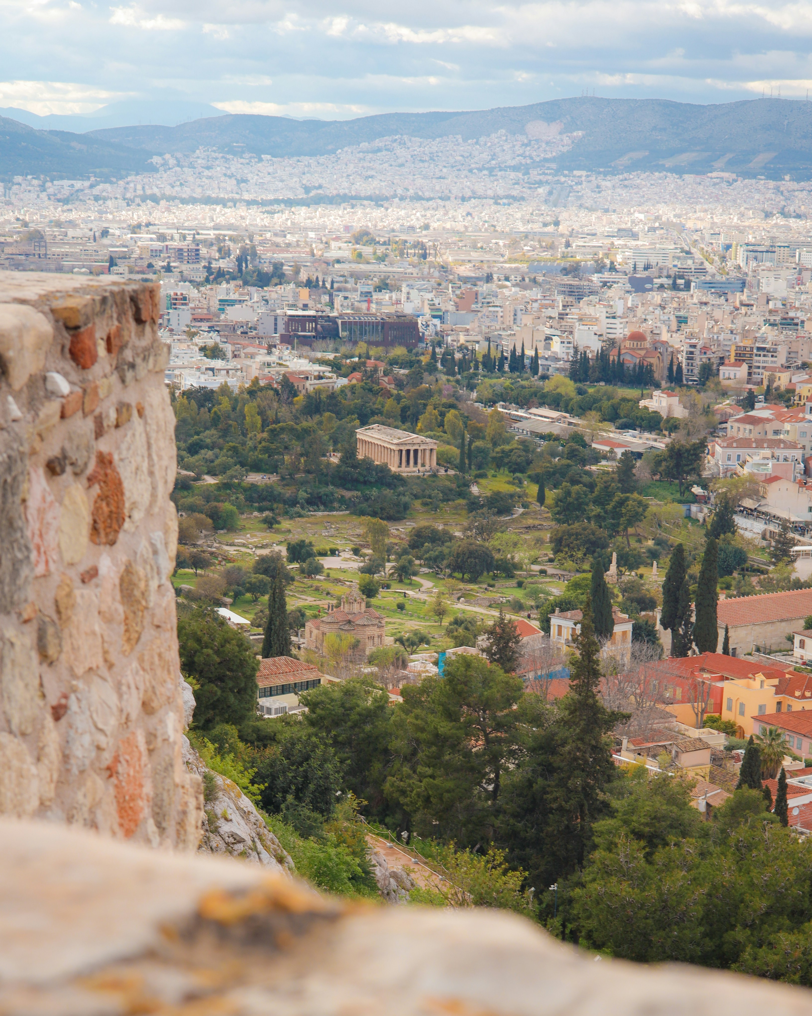 Ancient ruins and cityscape viewed from above
