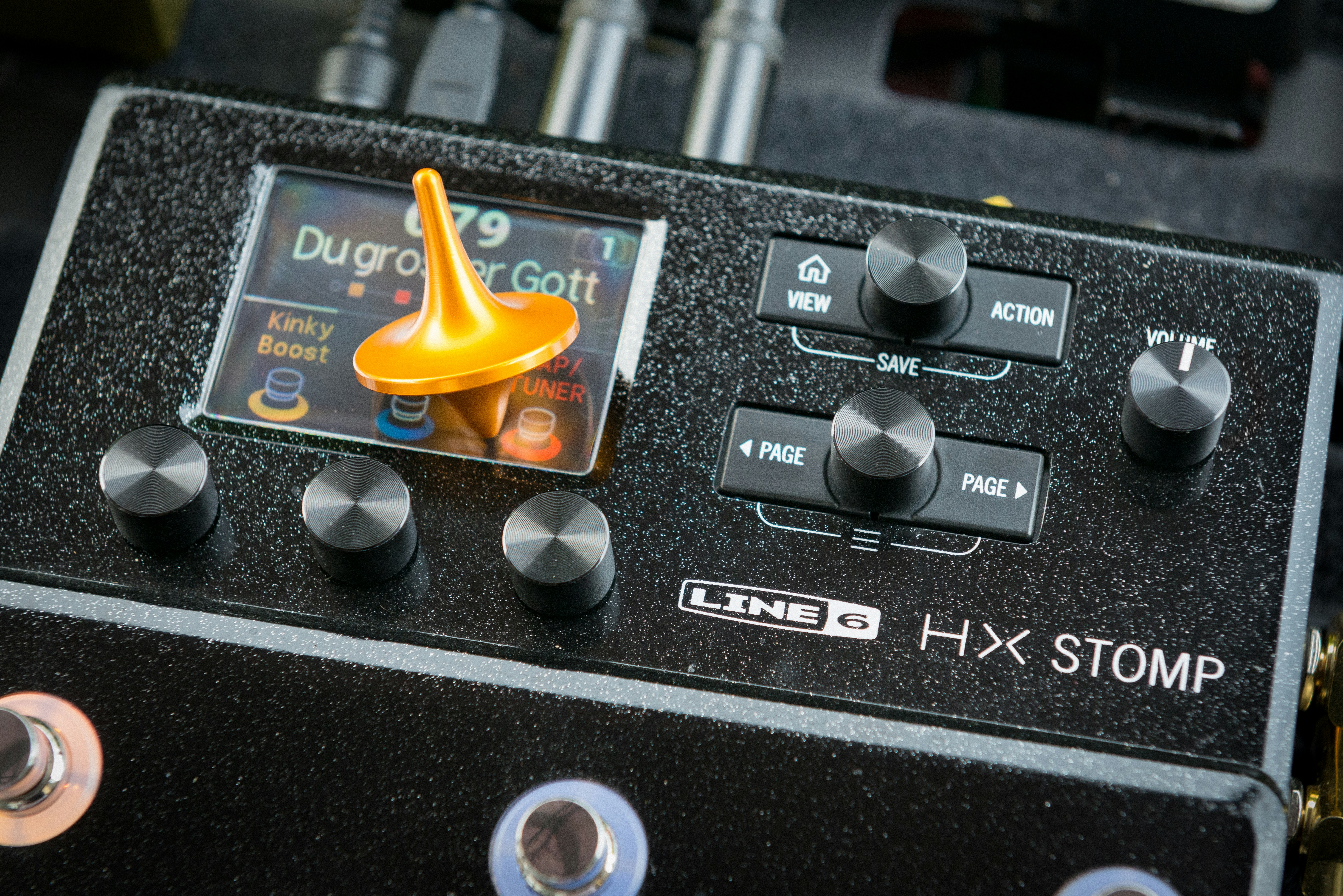 Close-up of a spinning top on a digital display.