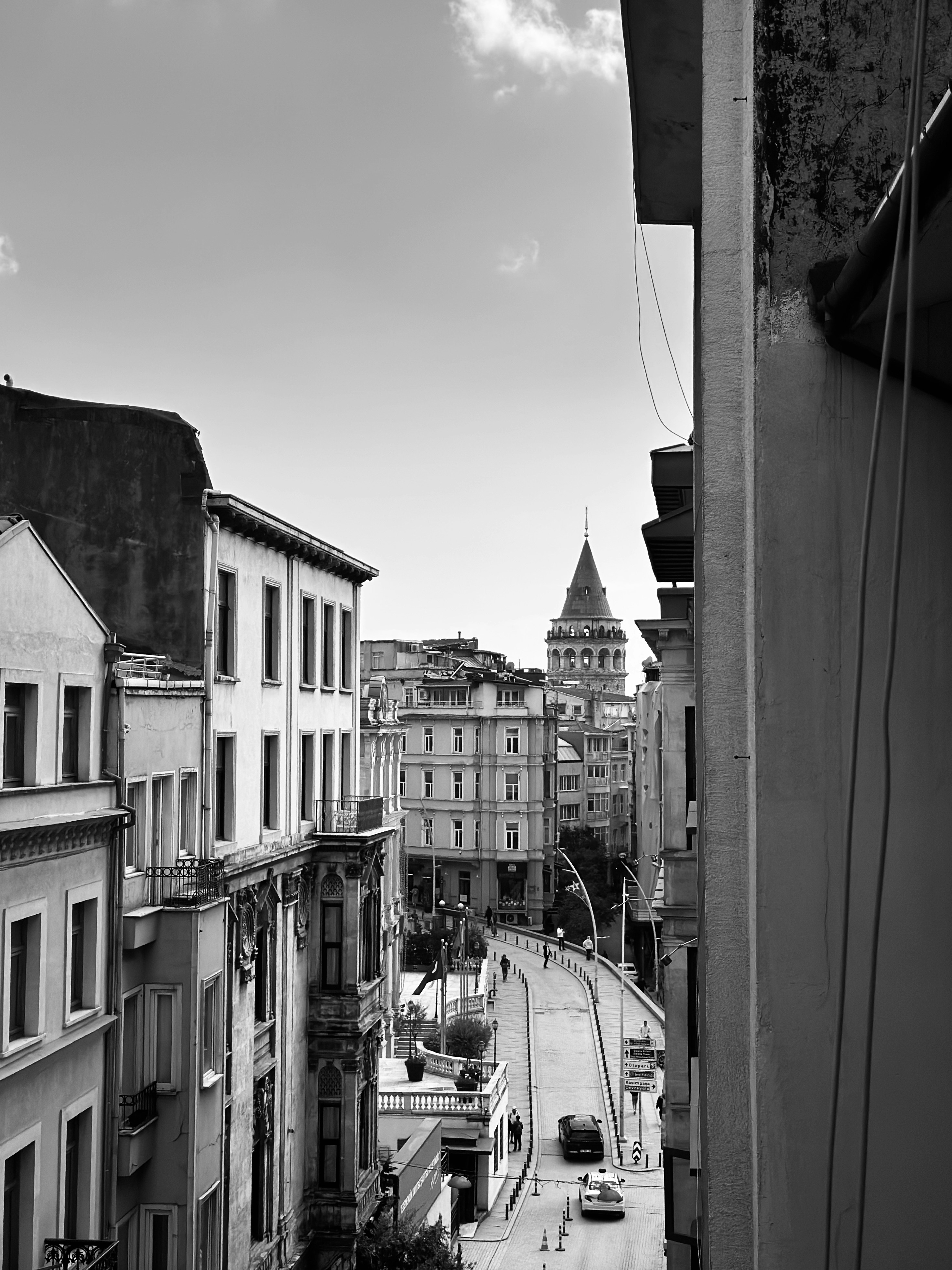 Black and white view of istanbul street with galata tower.