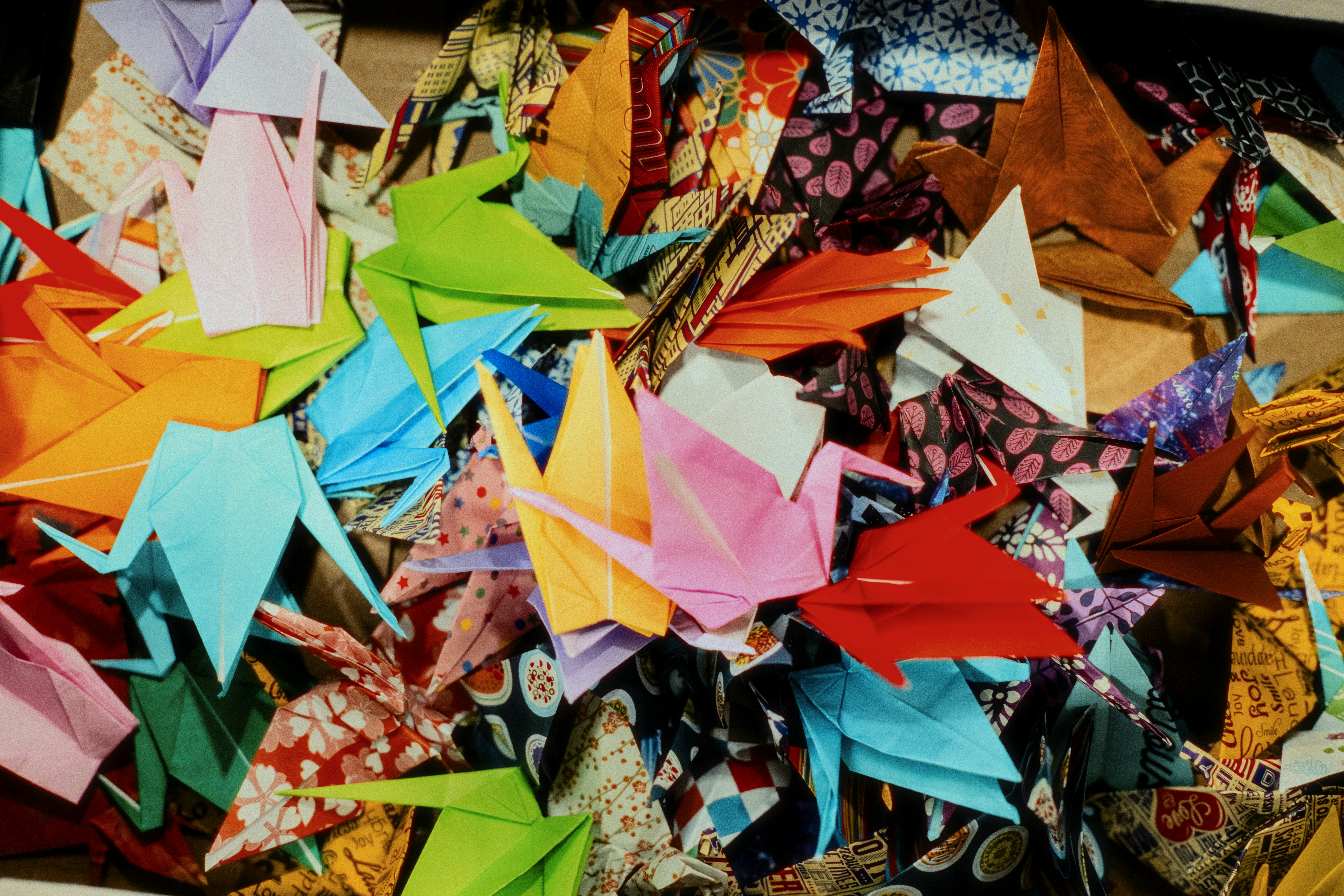 A colorful collection of origami paper cranes