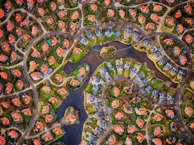 Aerial view of a suburban neighborhood with winding streets.