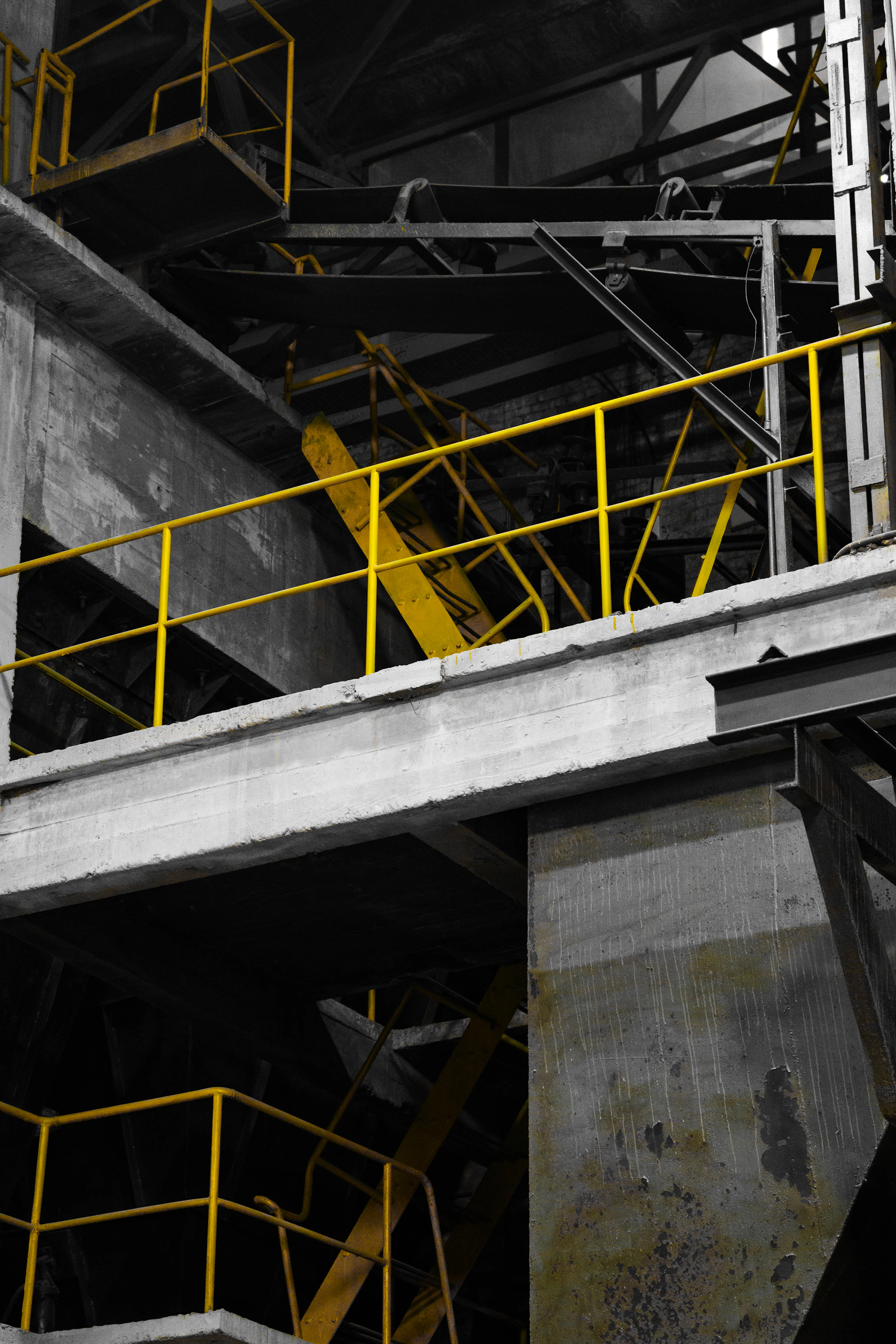 Industrial structure with yellow safety railings