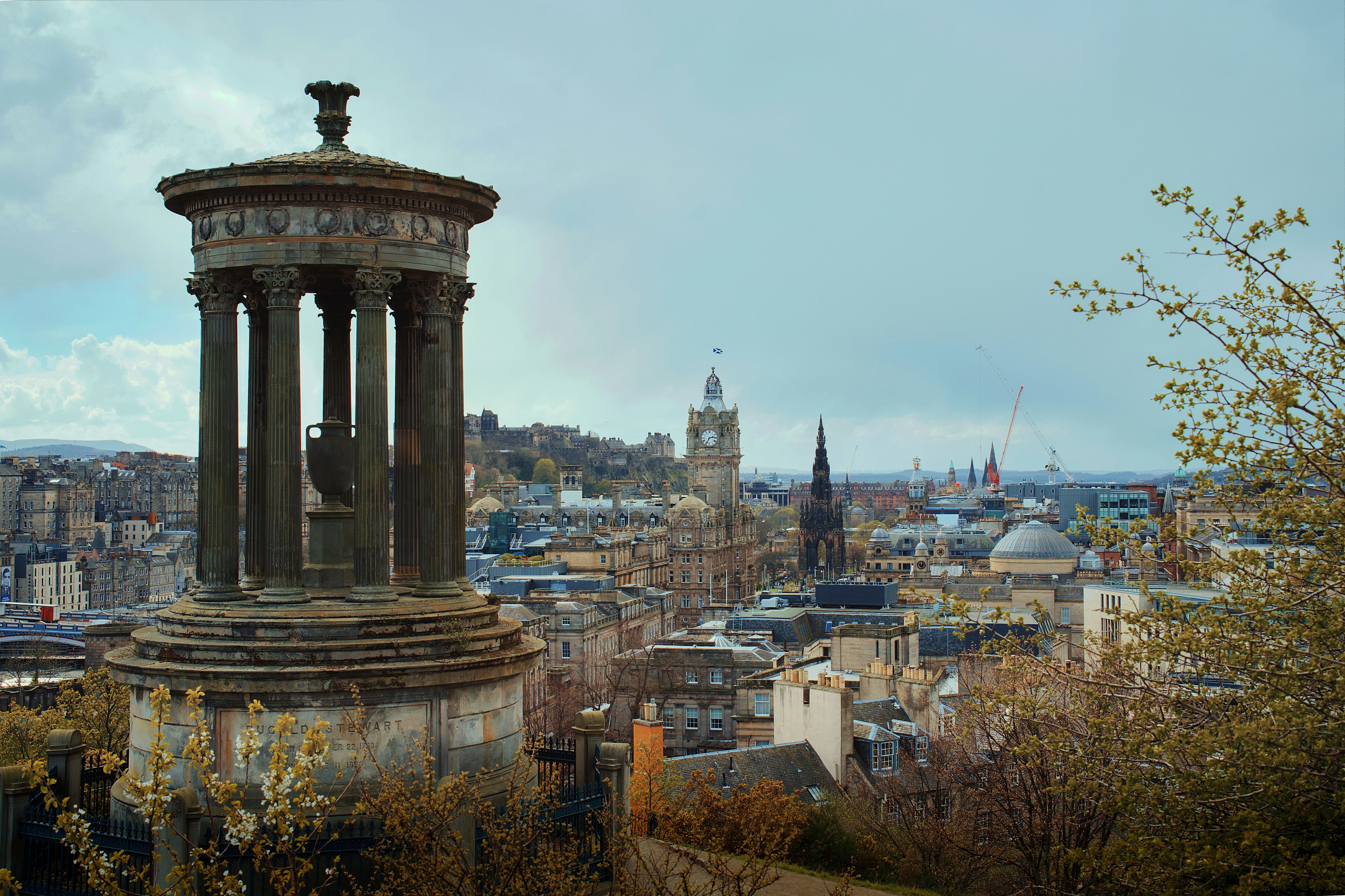Monument and cityscape with cloudy sky