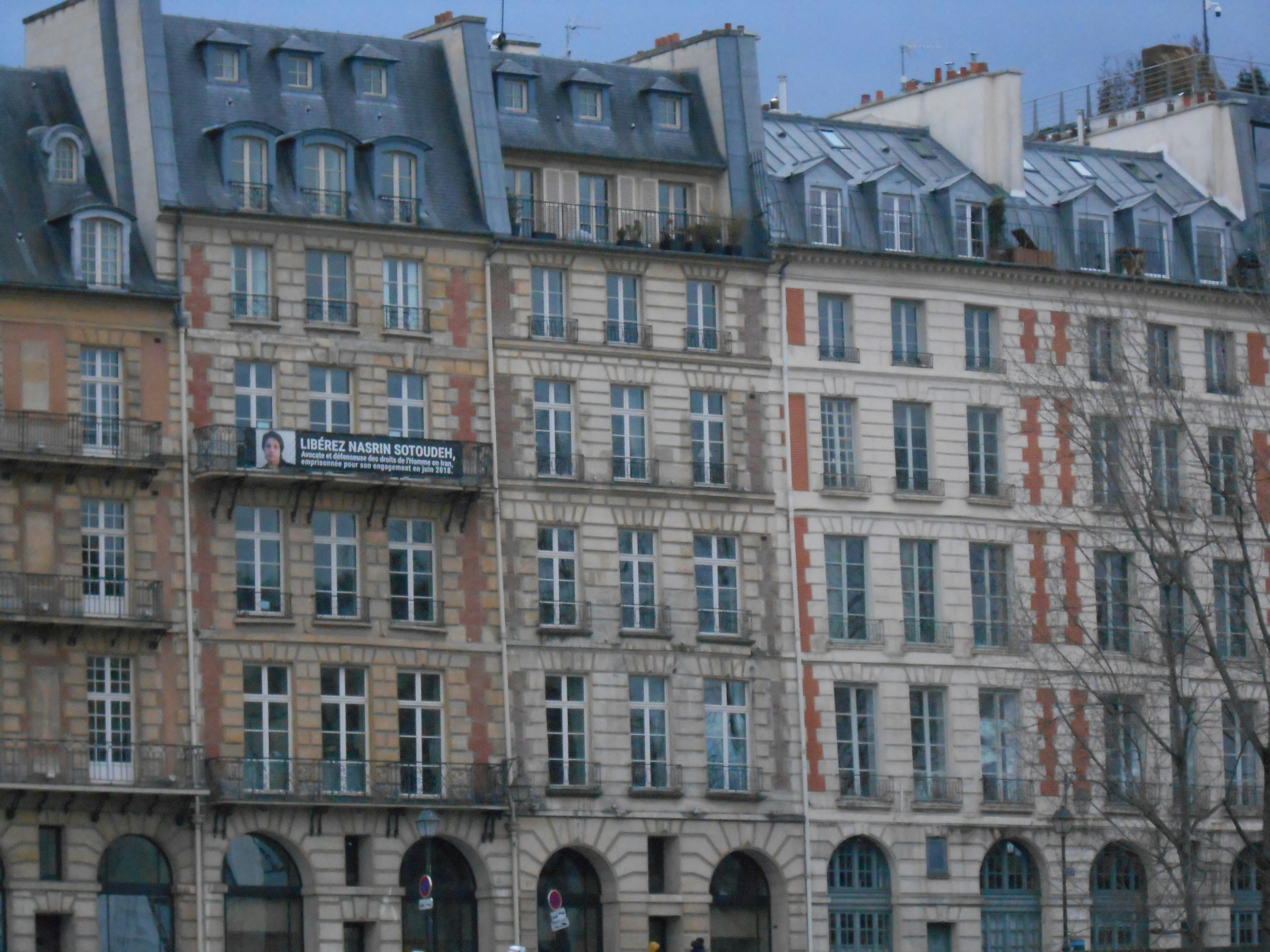 Row of traditional parisian apartment buildings