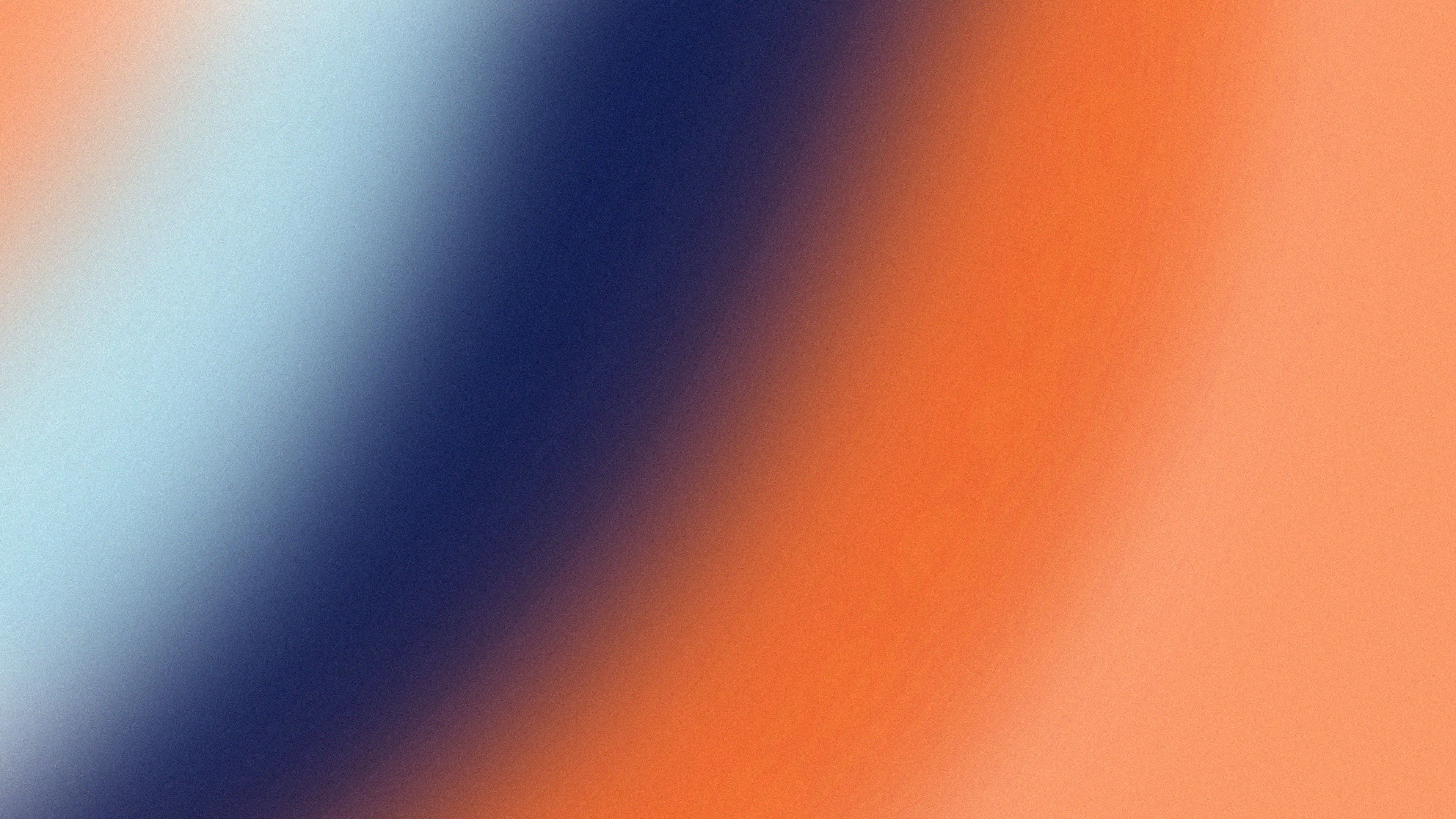 Diagonal gradient of navy blue, light blue, and orange.