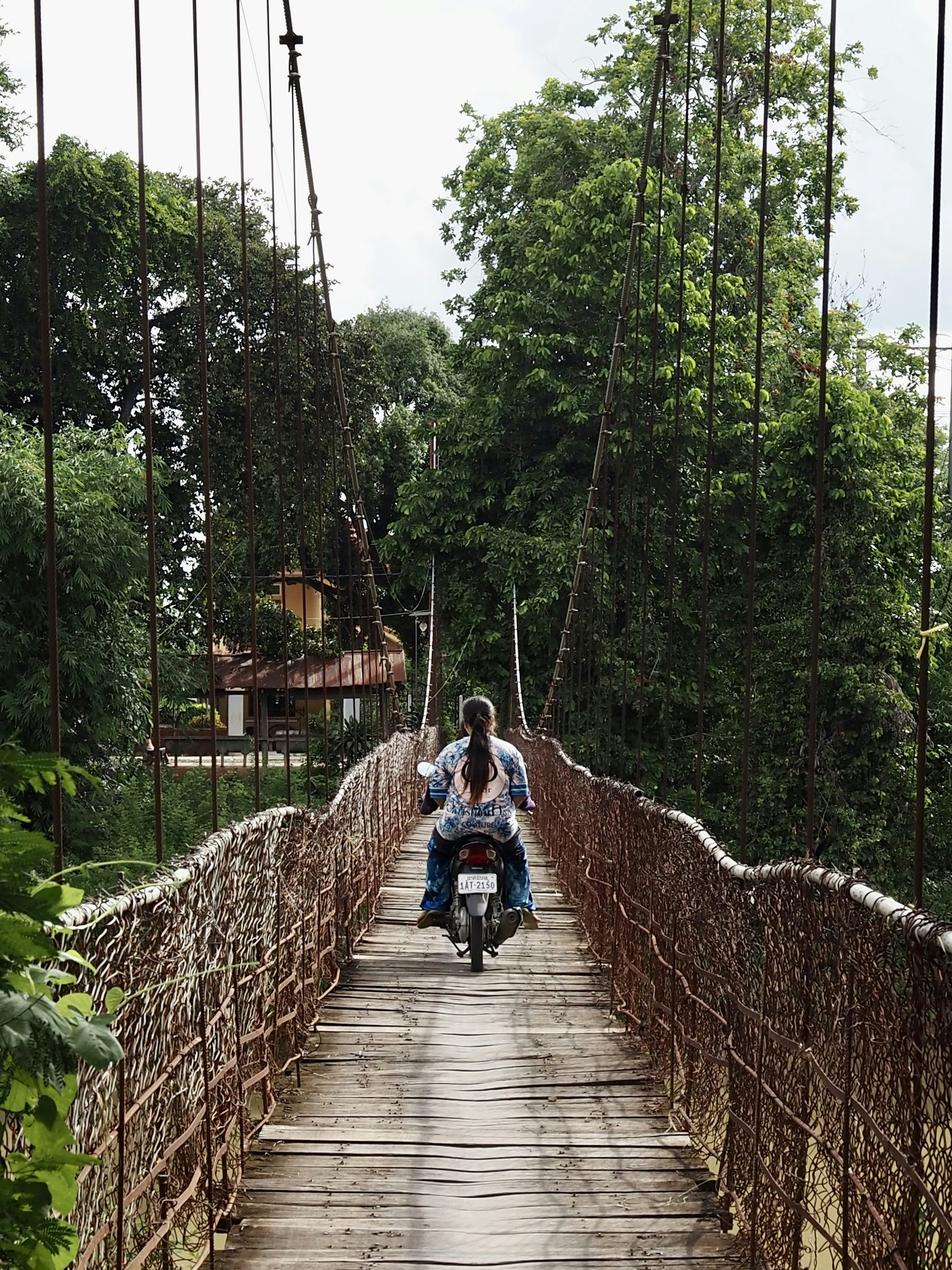Traveler participating in adventure sports travel insurance covered activity abroad
