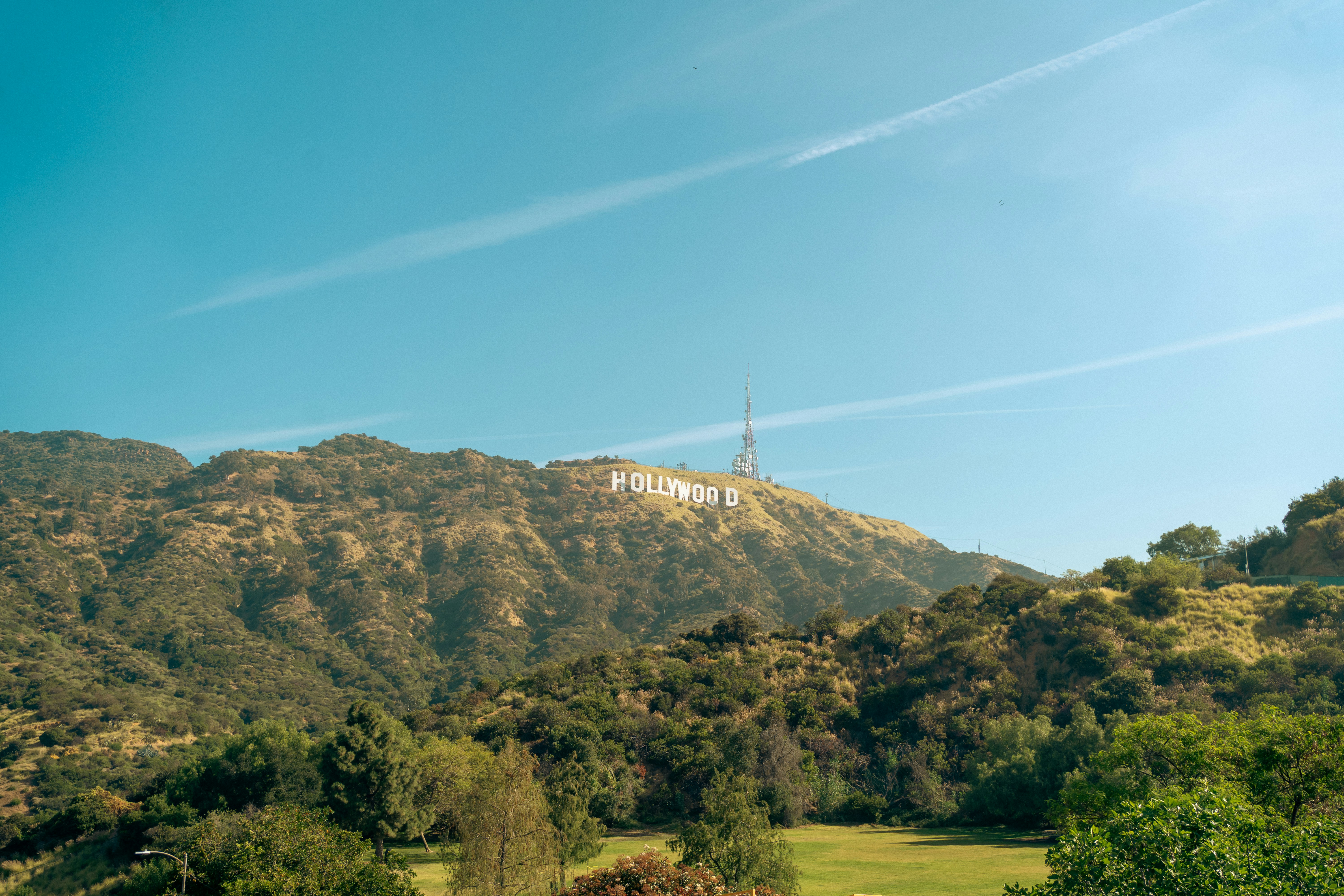 The iconic hollywood sign on a sunny day.