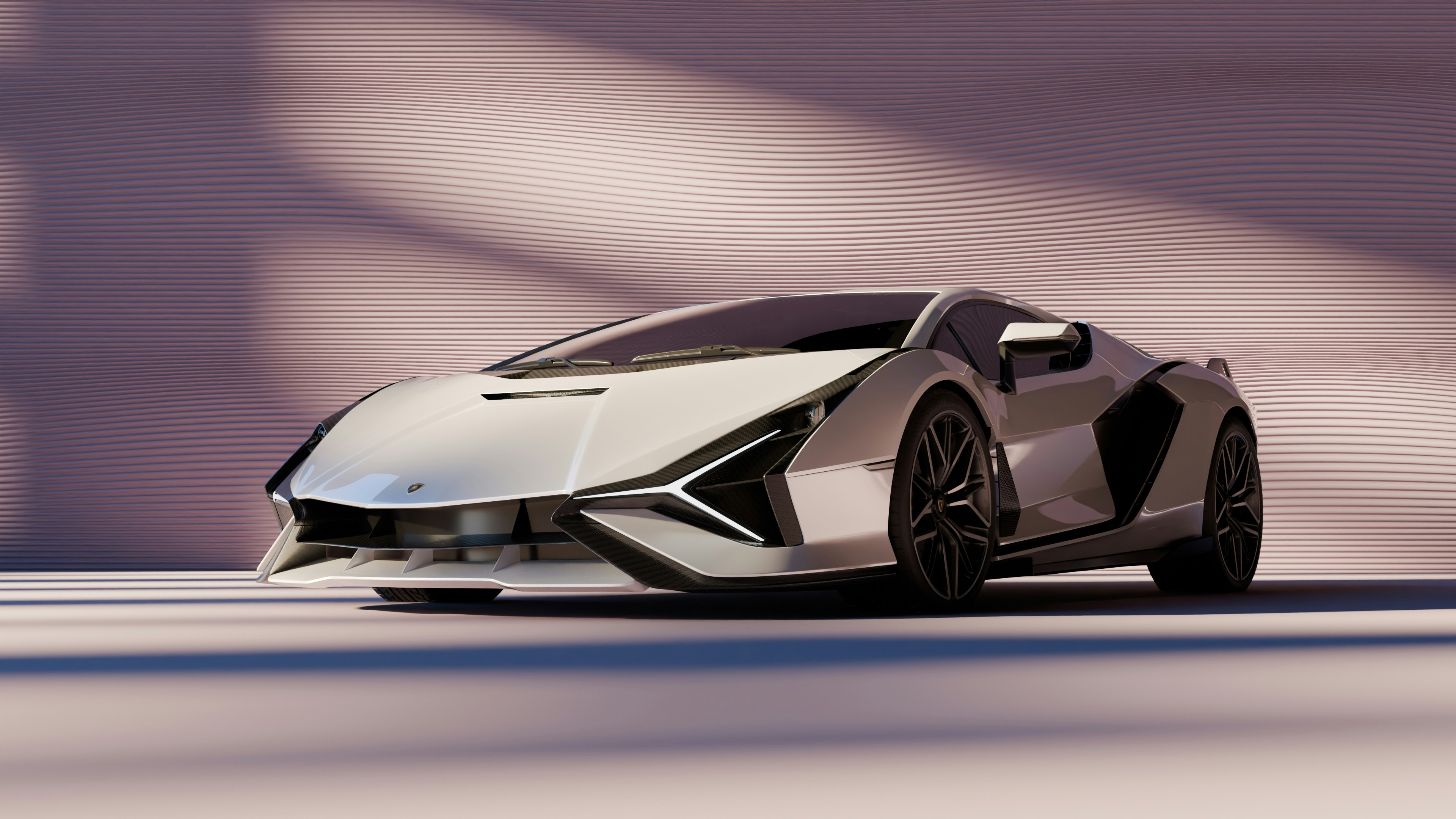 A sleek white sports car with black wheels.