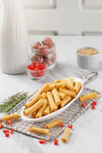 Crispy spring rolls served with fresh strawberries and herbs