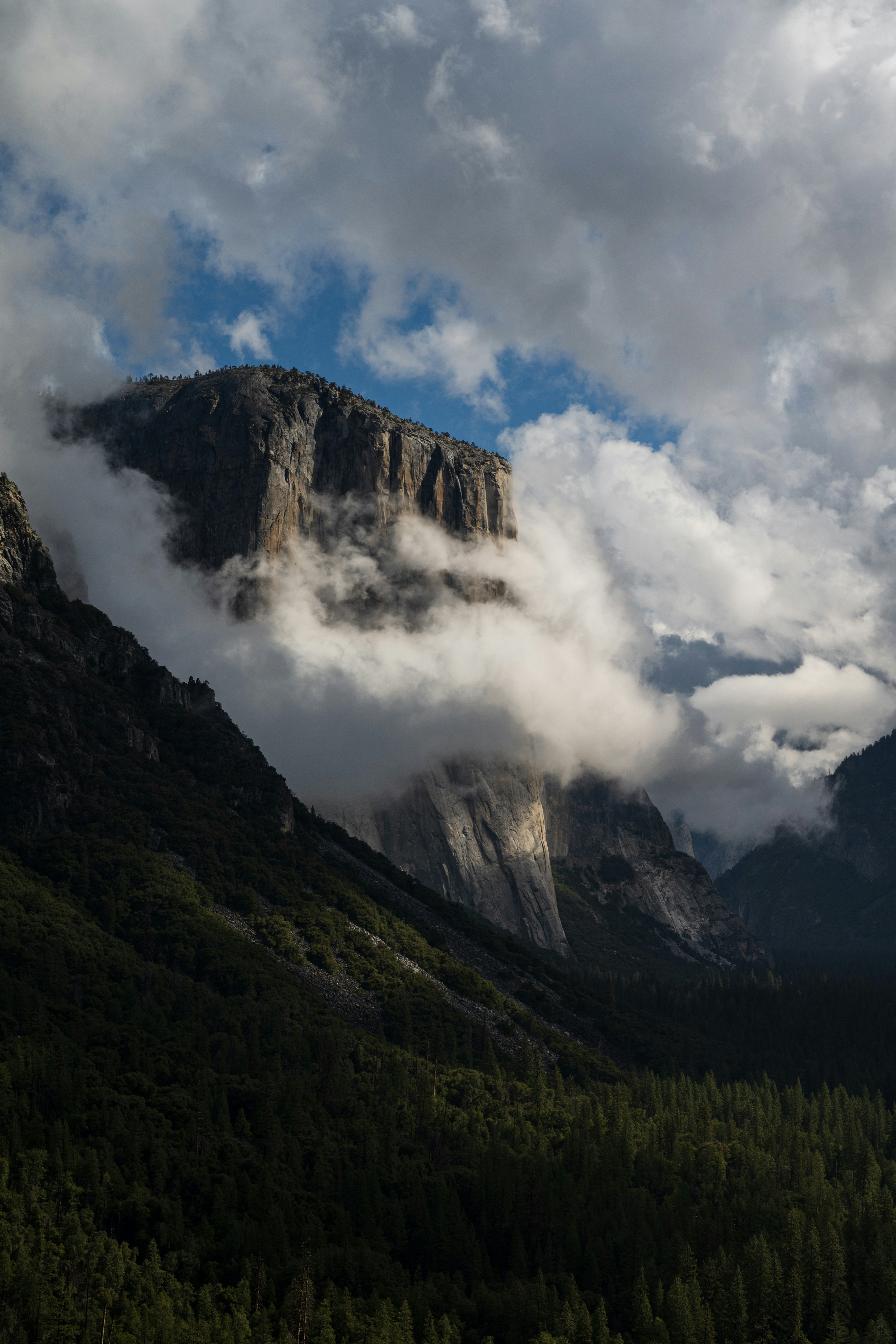 Majestic el capitan peak shrouded in clouds