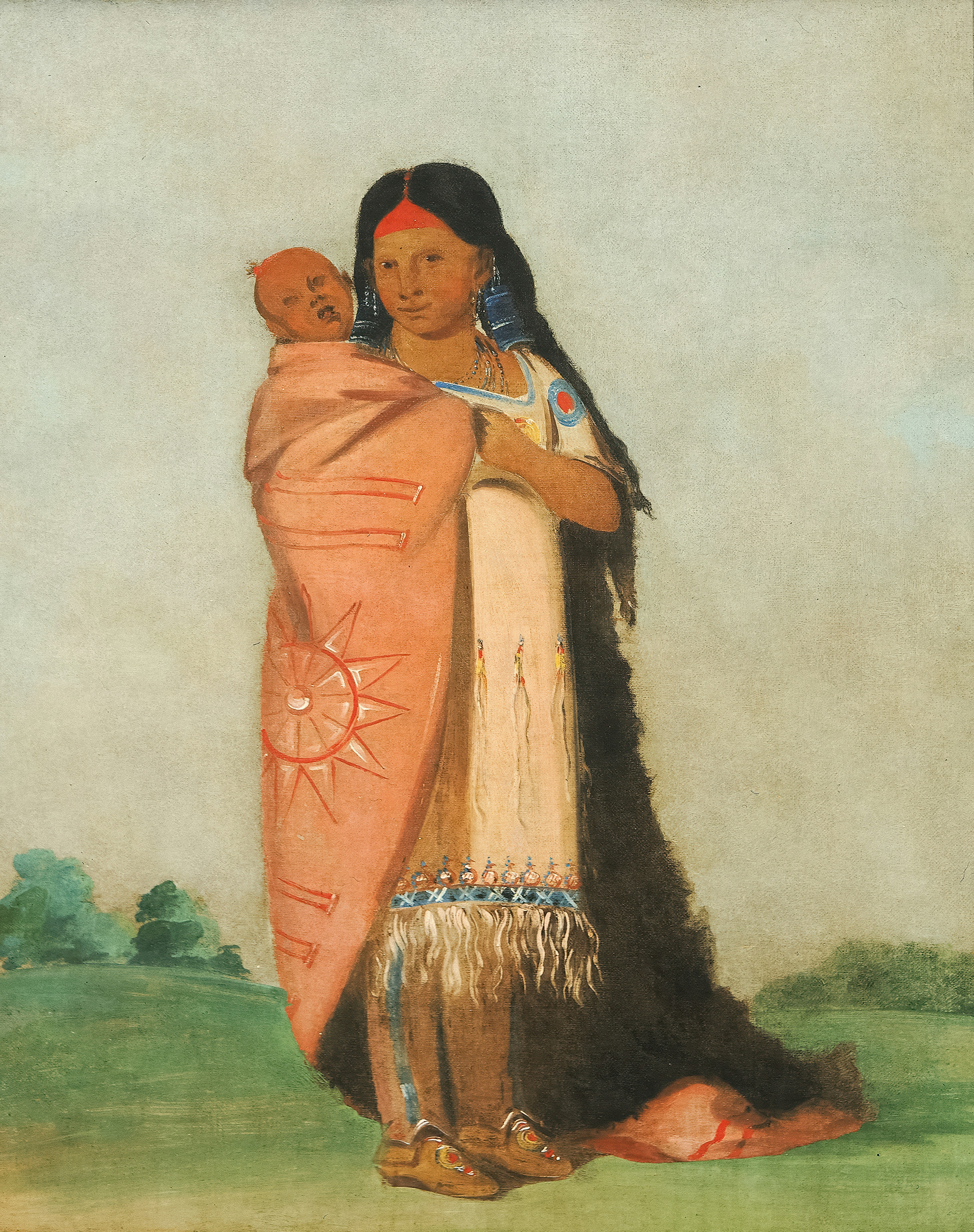 Native american woman carrying a baby on her back