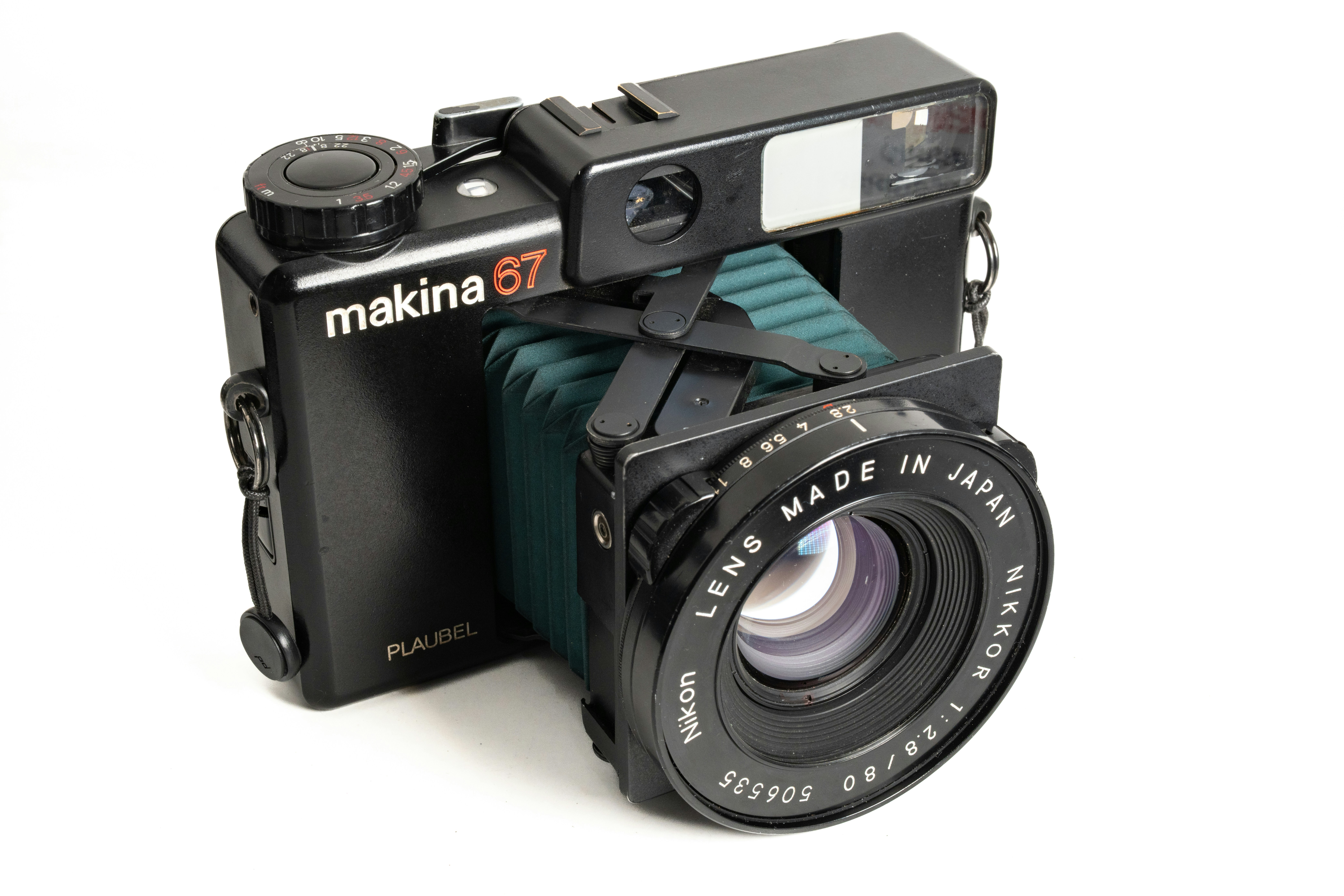 A black vintage makina 67 camera with a nikon lens
