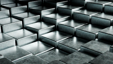 Abstract metallic cubes arranged in a stepped pattern.