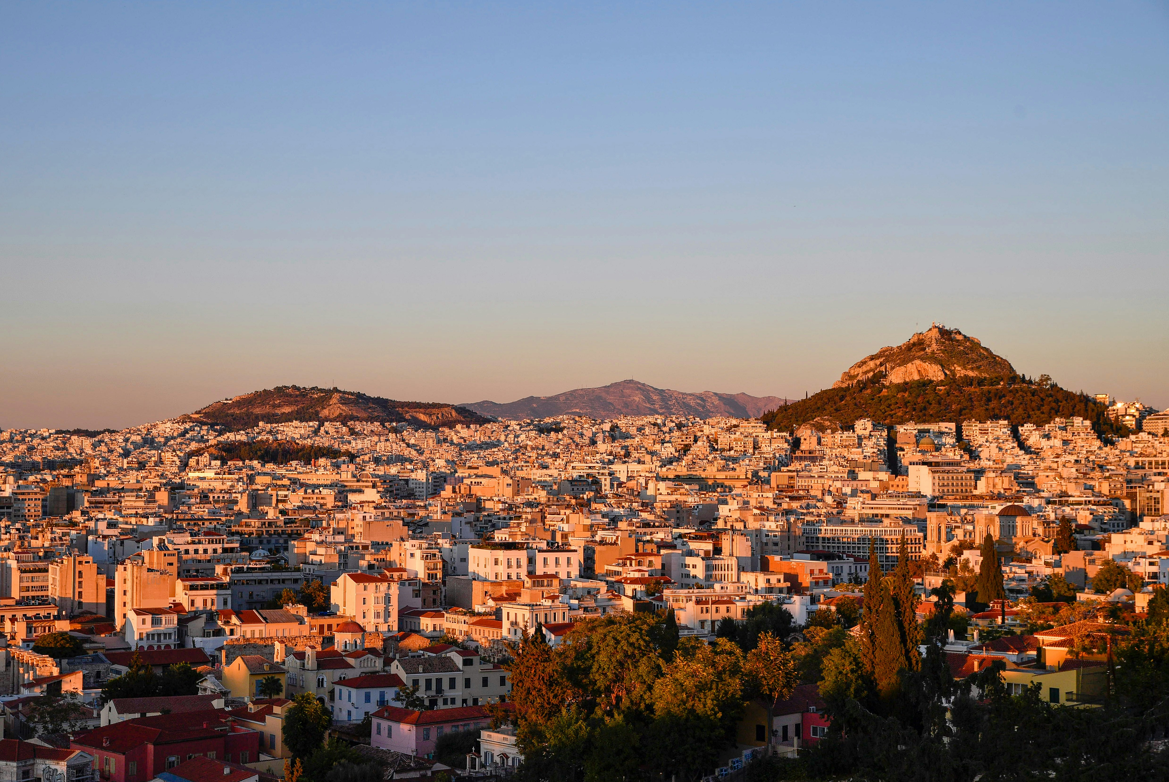 Cityscape with hills at sunset