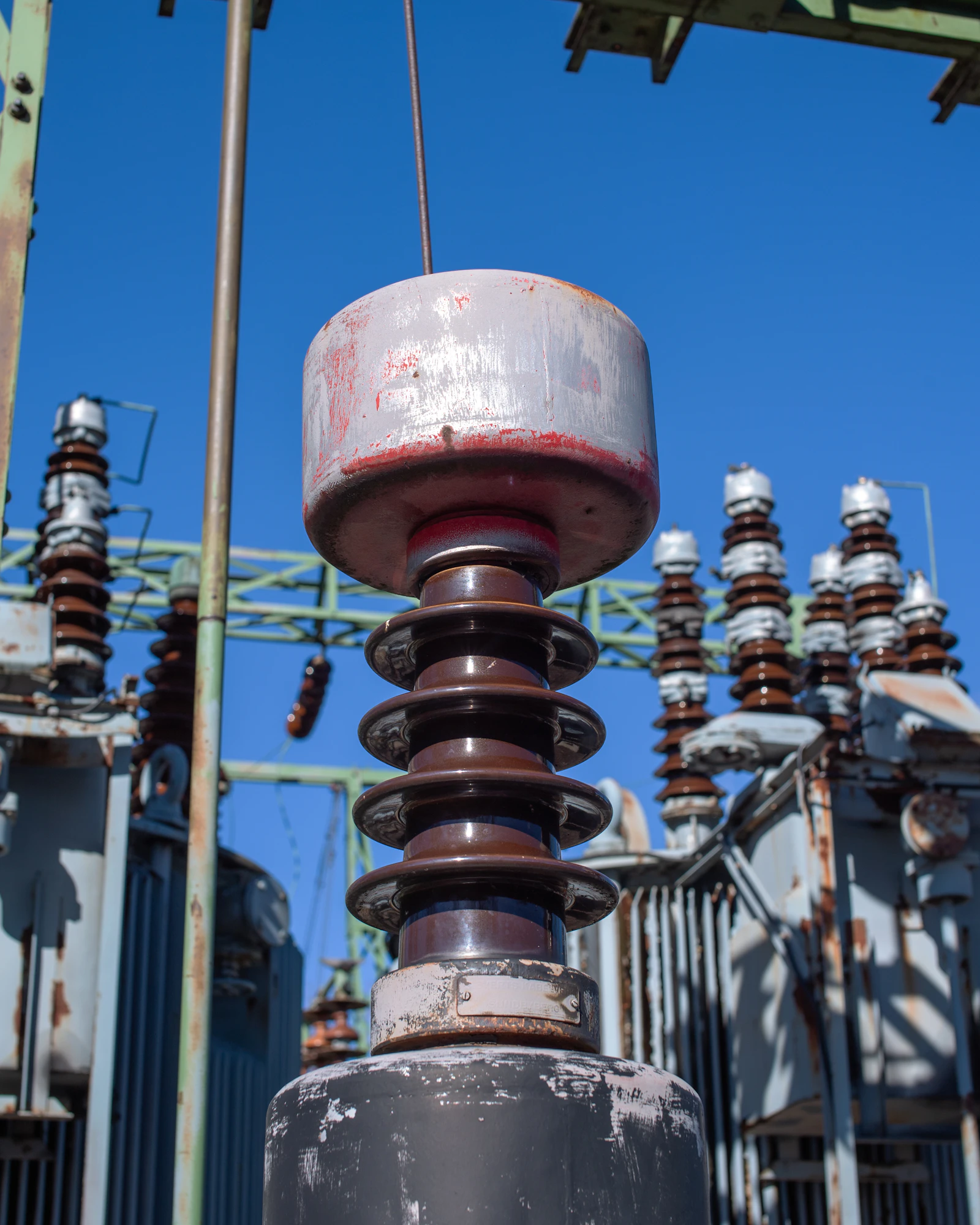 Electrical insulators at an industrial substation.