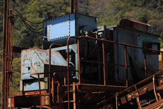 Old industrial machinery with rust and debris
