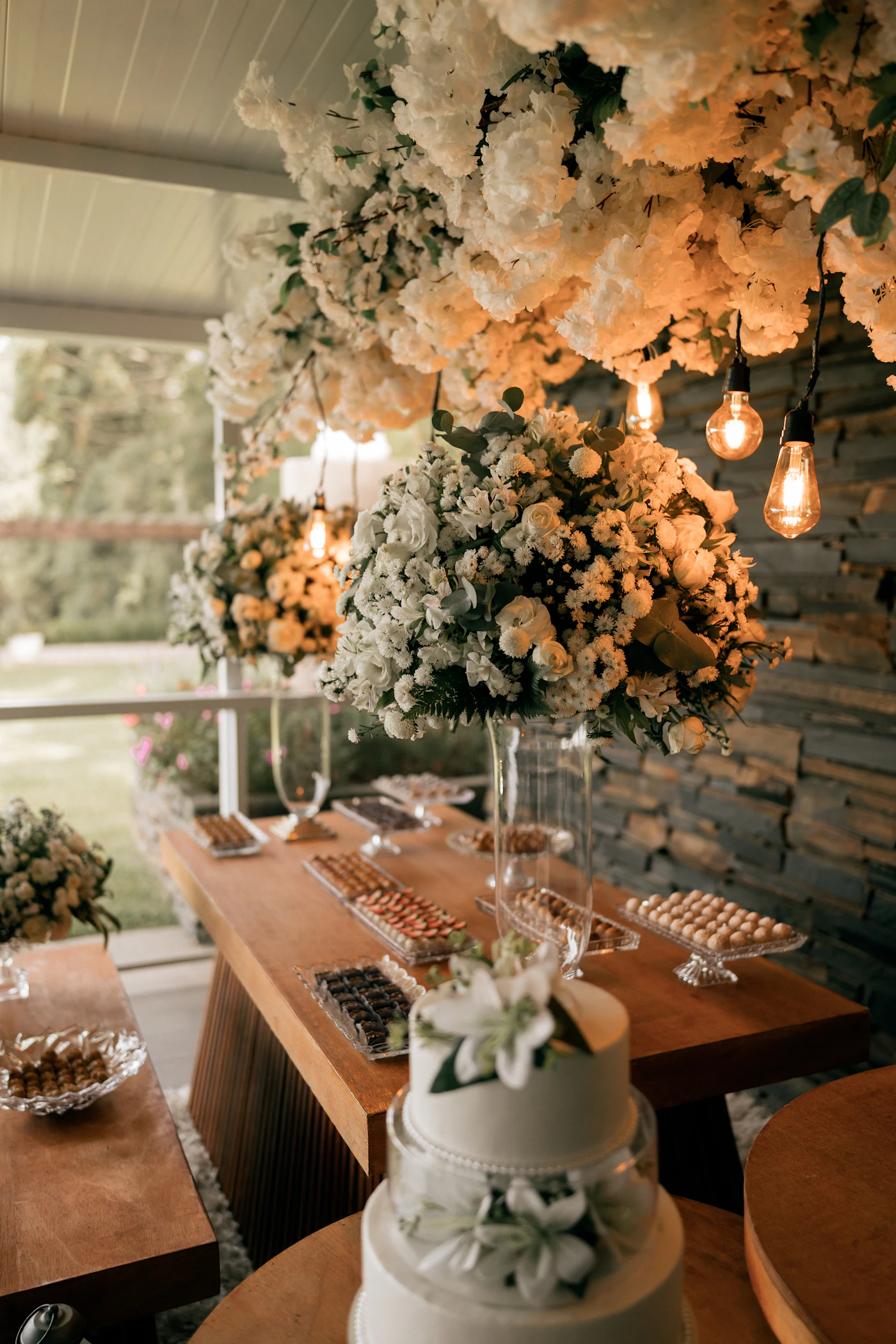 How to build a DIY donut wall for weddings — A beautifully styled donut wall serves as the centerpiece for a wedding dessert table.