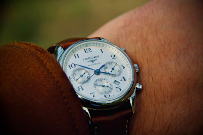 Man wearing a longines automatic chronograph watch