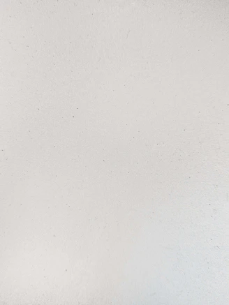 A plain white textured background