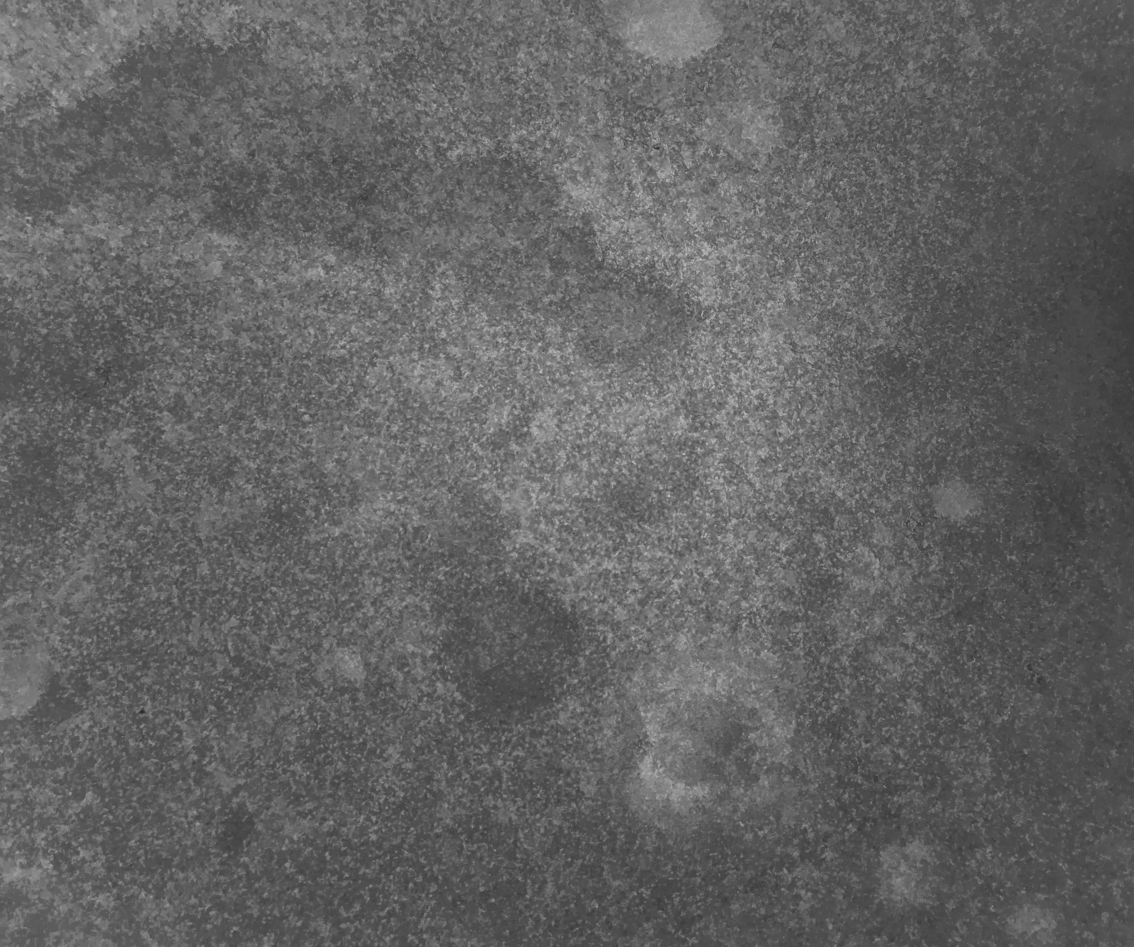 Abstract textured gray background with lighter circular shapes.