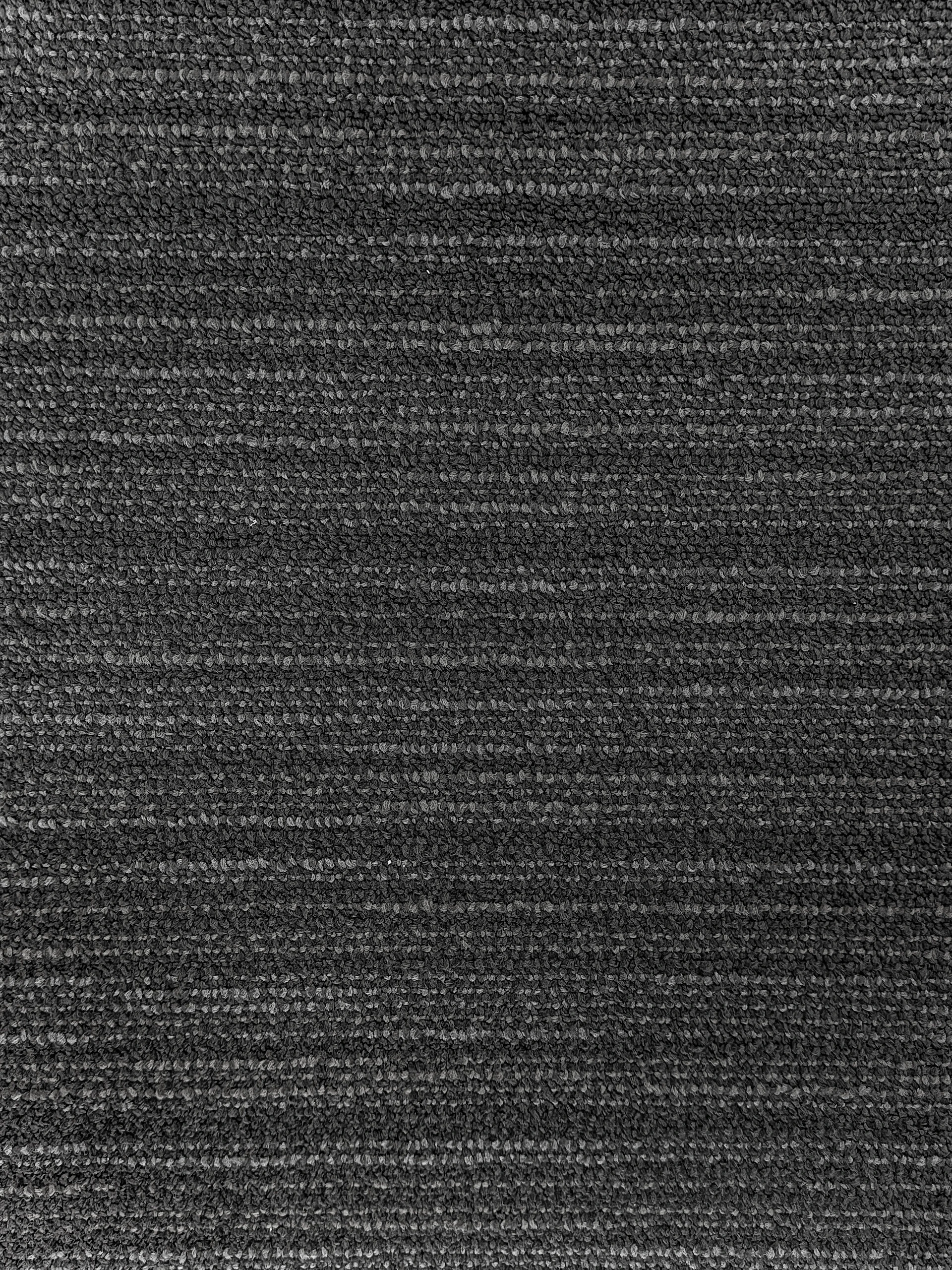 Close-up of dark grey textured fabric